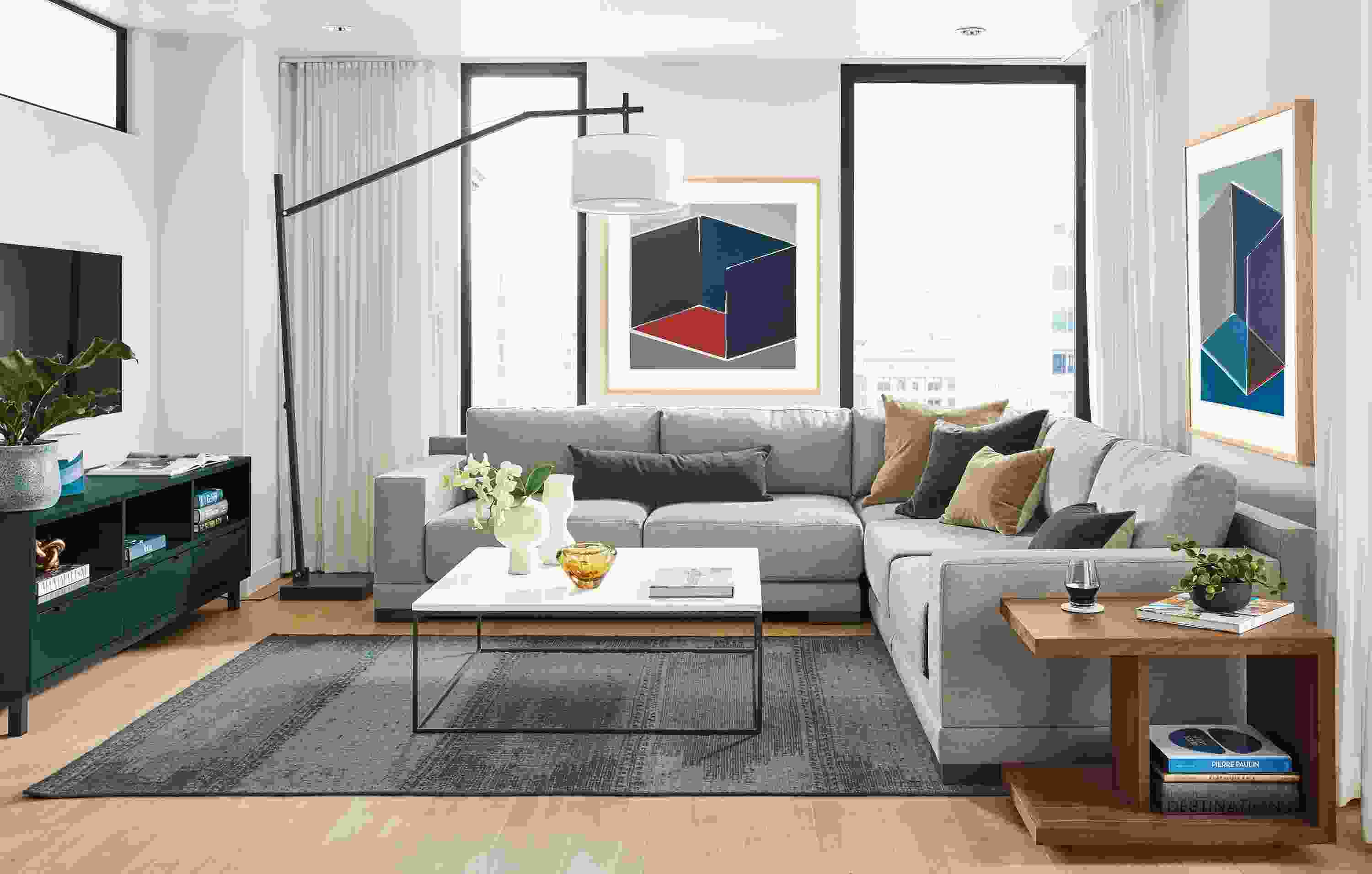 Detail of Mira extra-deep sectional in Desin Putty fabric in living room.