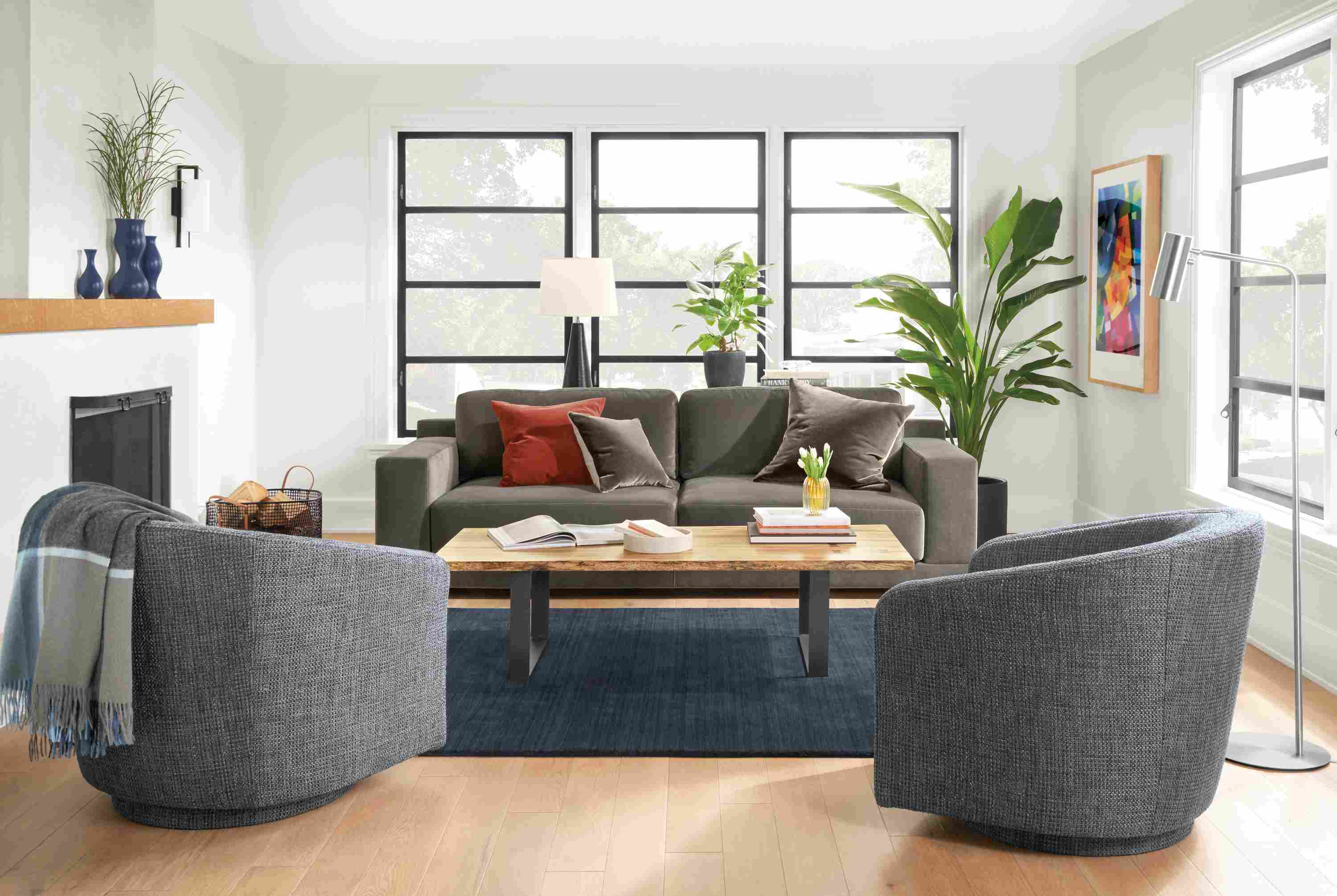 Detail of Mira sofa in Banks Charcoal velvet in small living room.