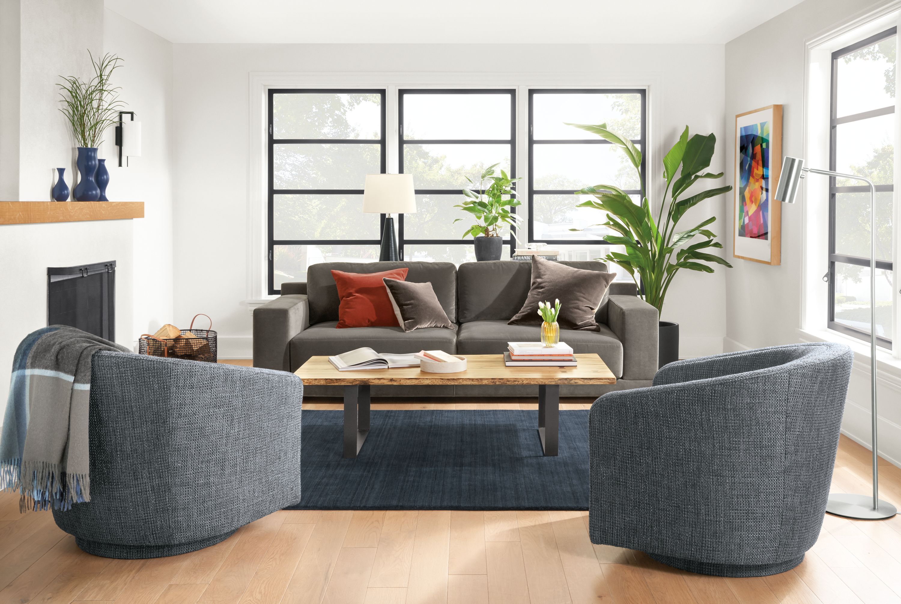 Detail of Mira sofa in Banks Charcoal velvet in small living room.