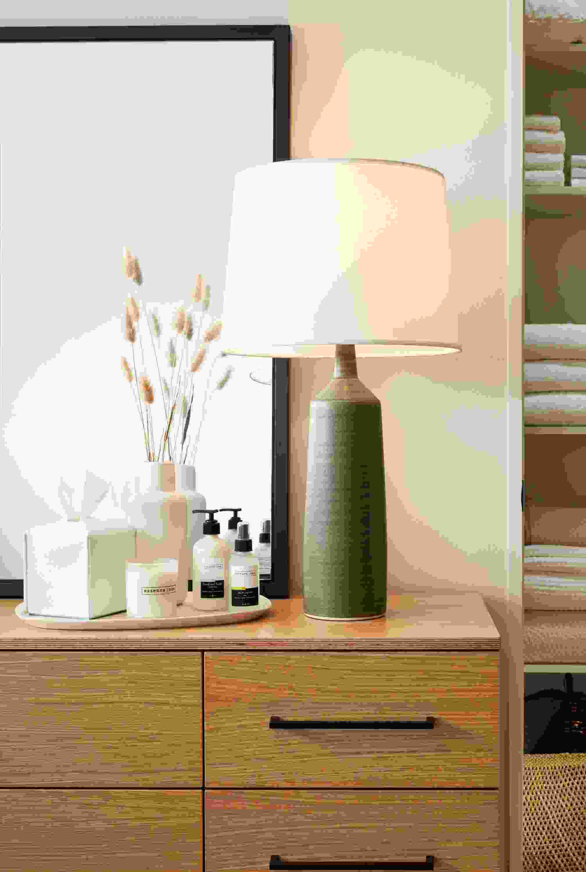 Bedroom with Monarch table lamp in moss.