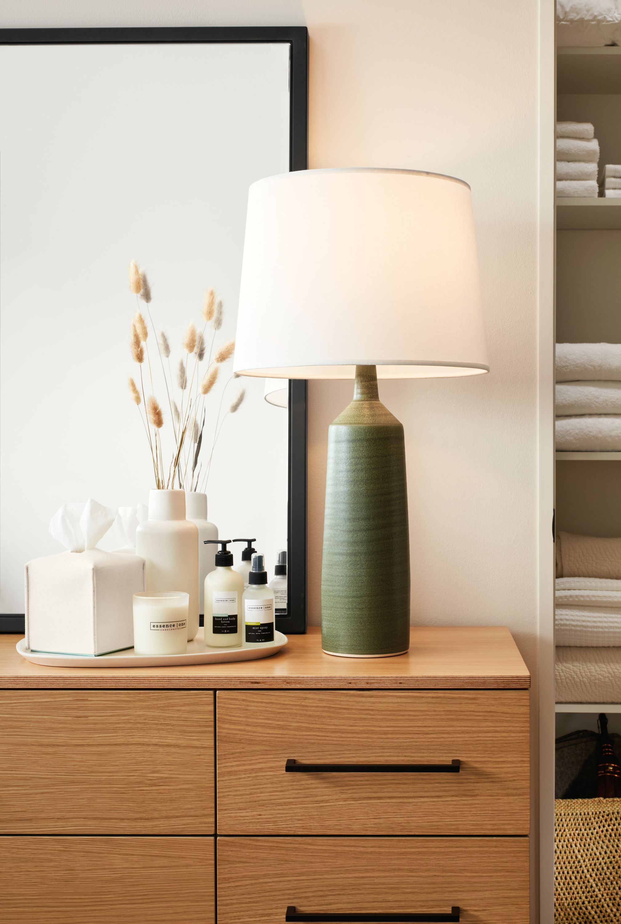 Bedroom with Monarch table lamp in moss.