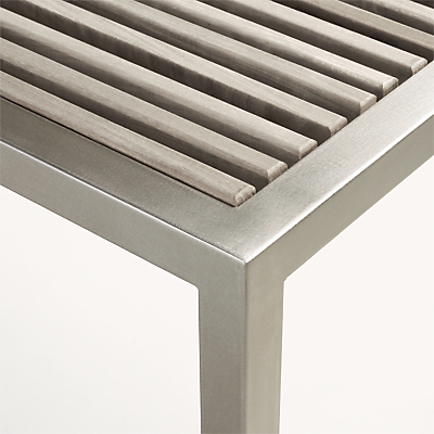 corner detail of Montego 54-wide Bench in aged Reclaimed Ash and stainless steel frame.