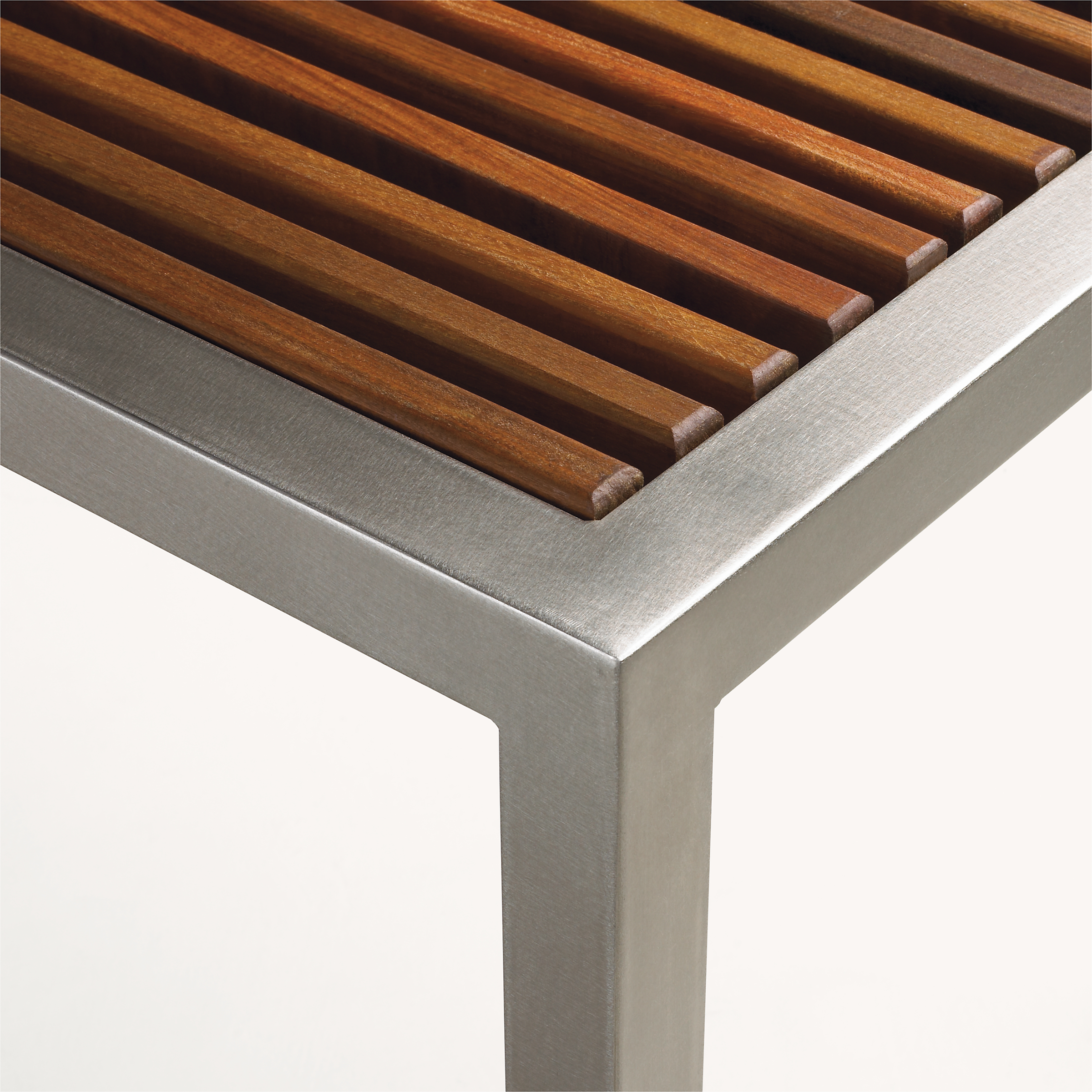 corner detail of Montego 54-wide Bench in new Reclaimed Ash and stainless steel frame.