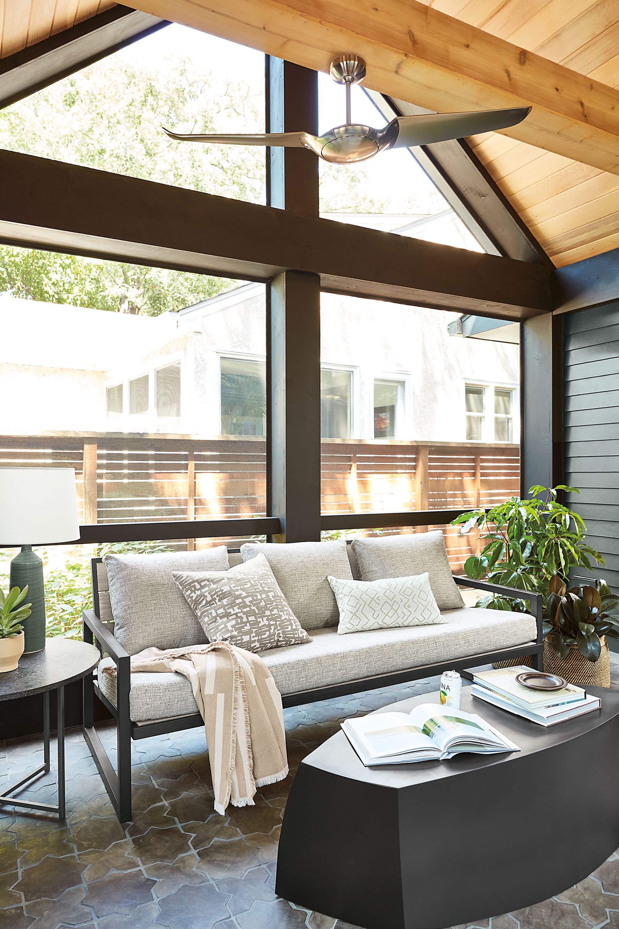 Detail of Montego outdoor sofa and lounge chair and coffee table in aged Ash.