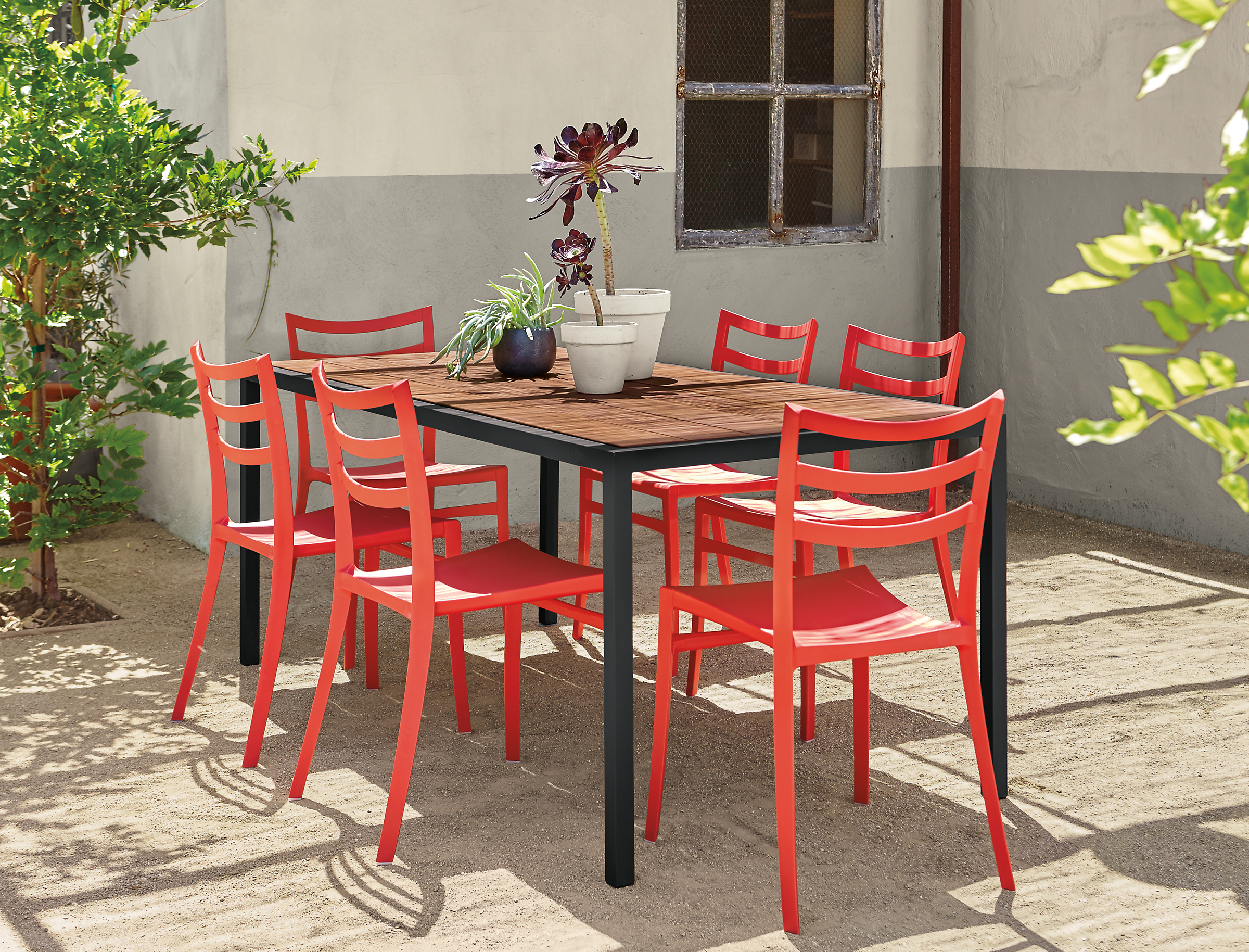 Montego table with six red chairs.