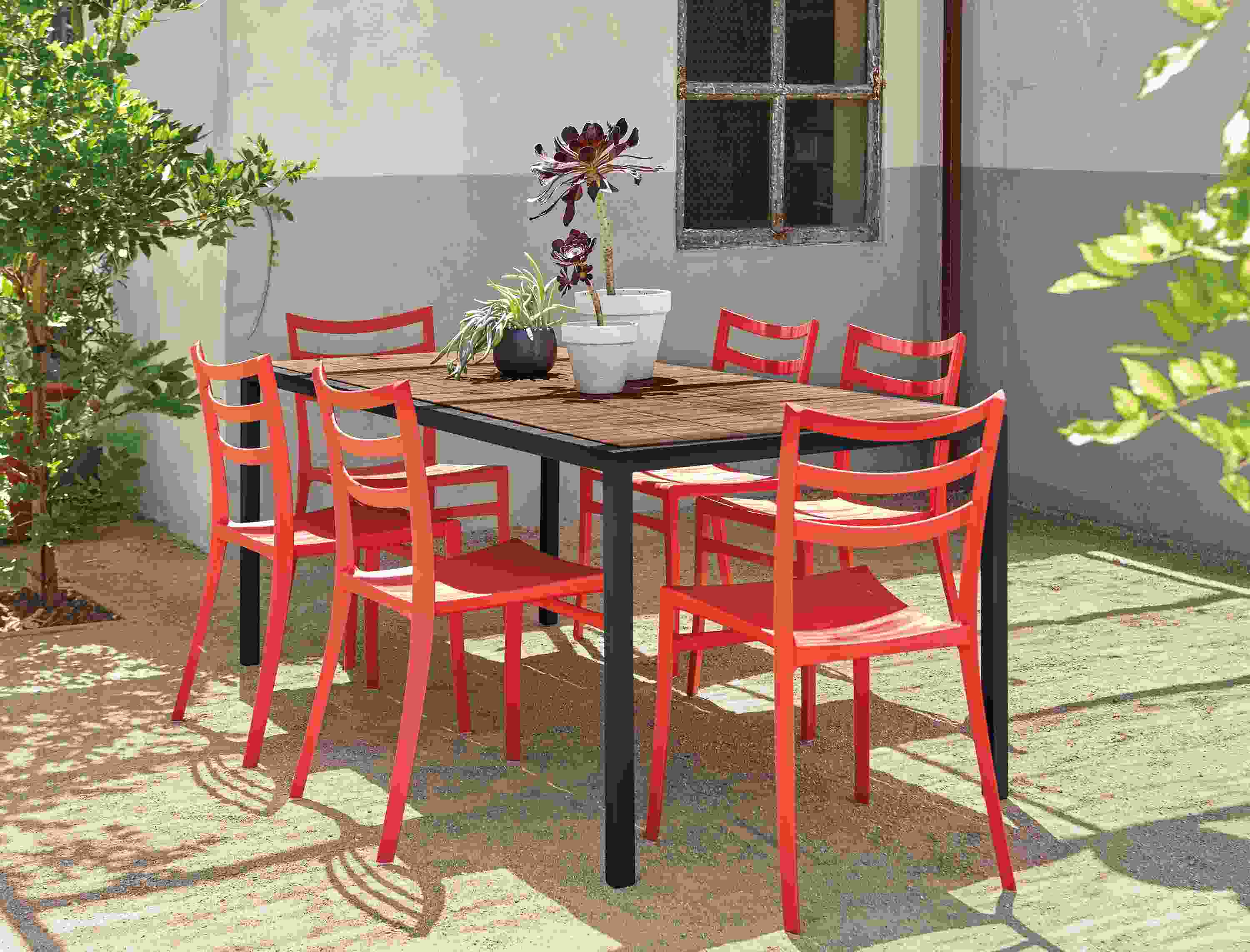 Montego table with six red chairs.