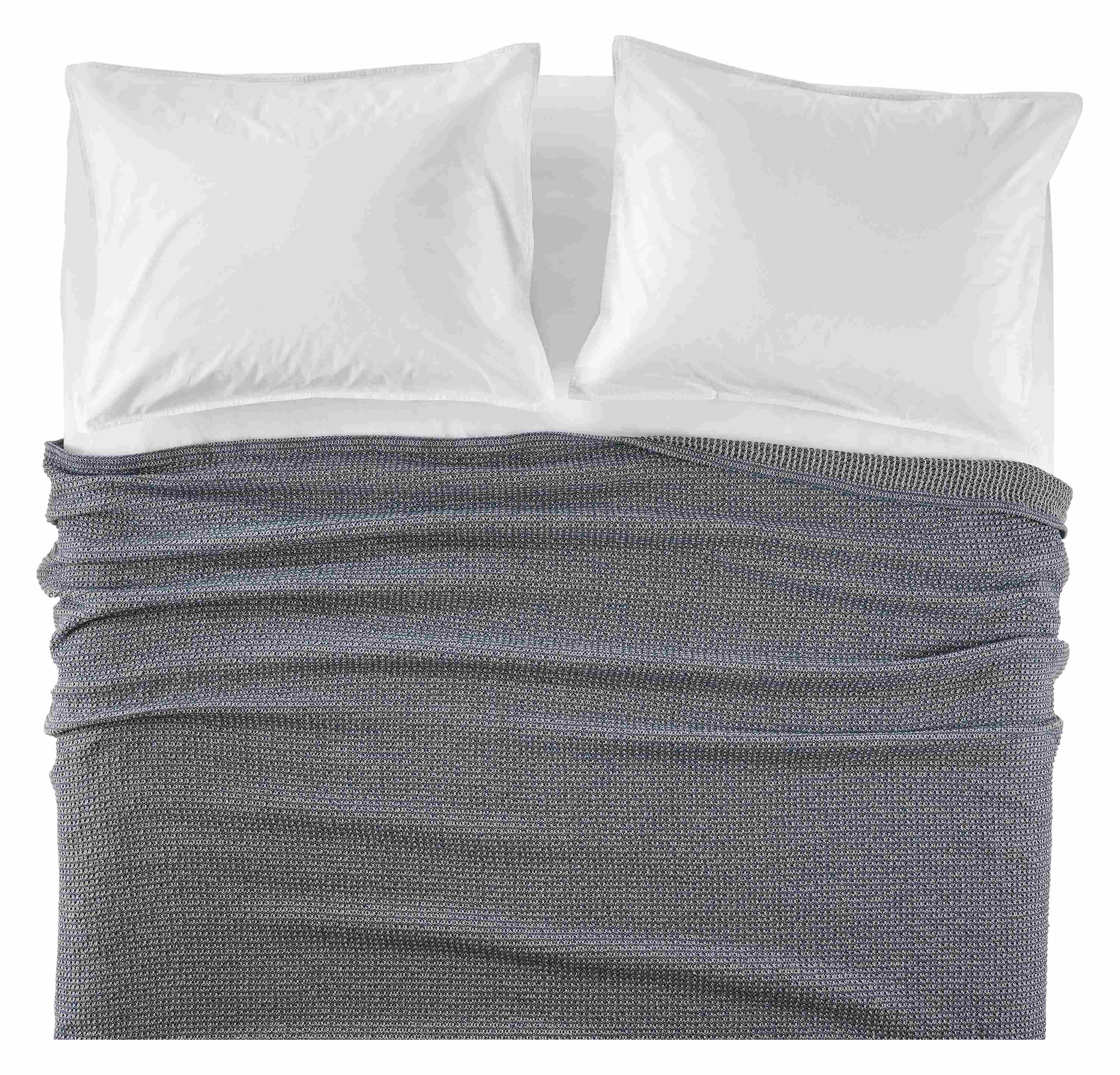 Overhead view of core queen bed with morgan blanket in denim and signature sham and sheets in white.