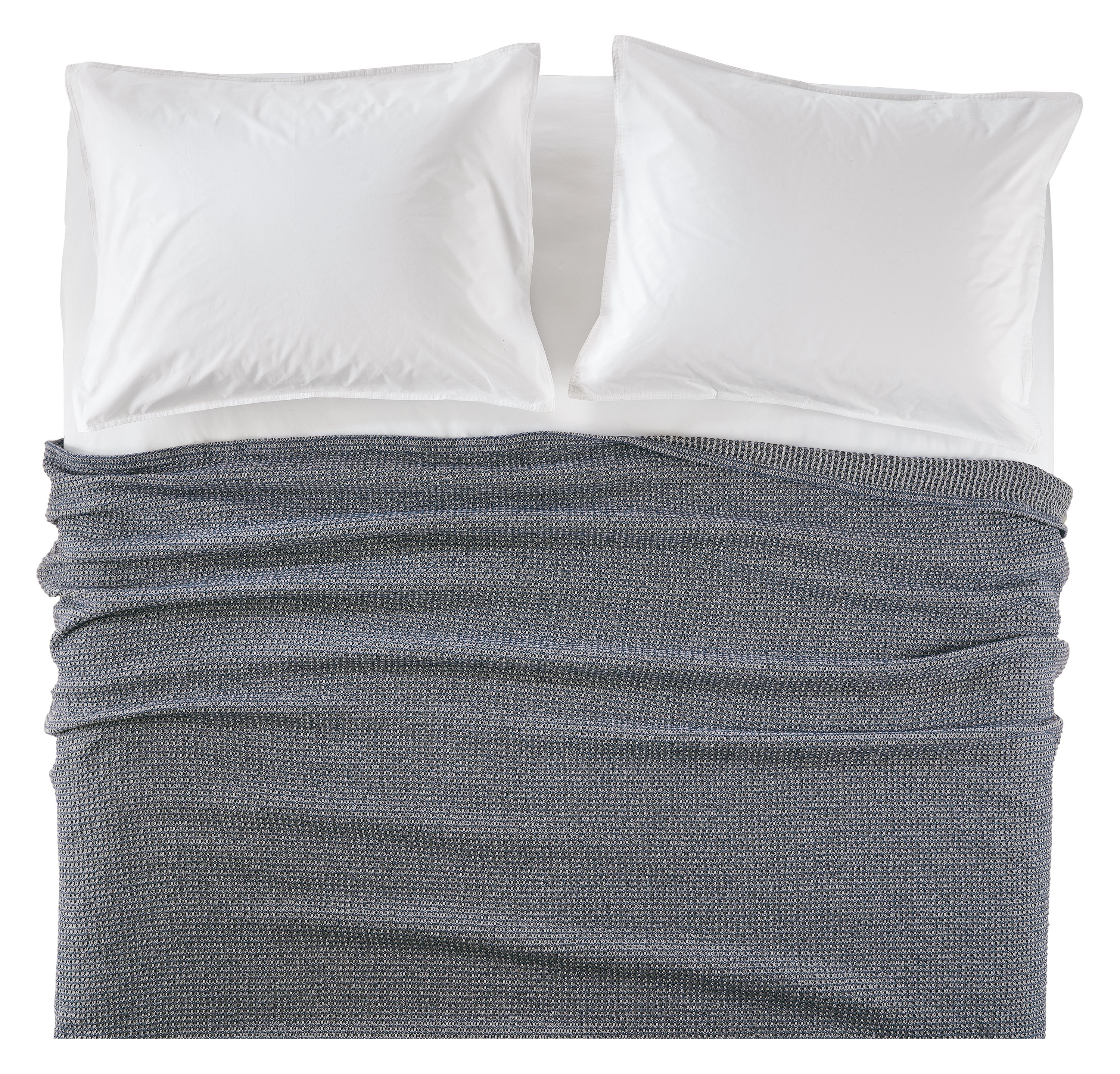 Overhead view of core queen bed with morgan blanket in denim and signature sham and sheets in white.