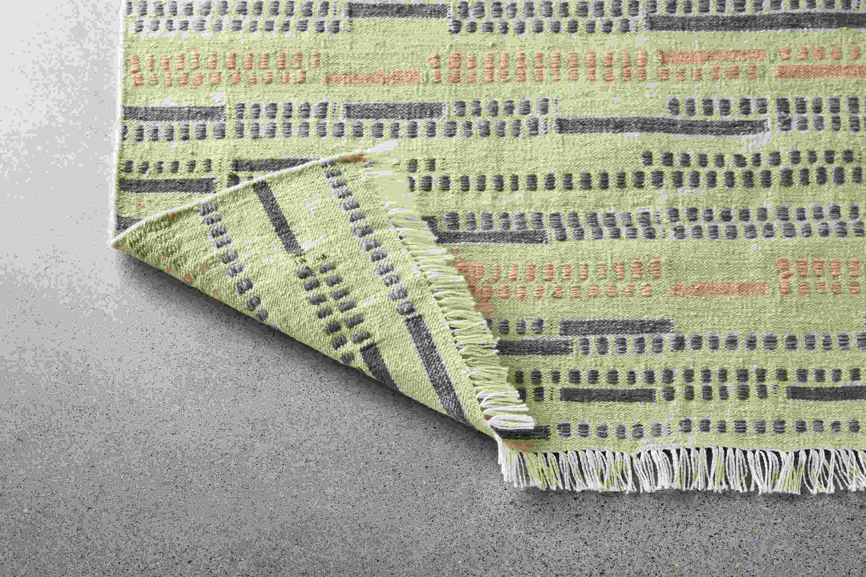Close detail of Morse rug.