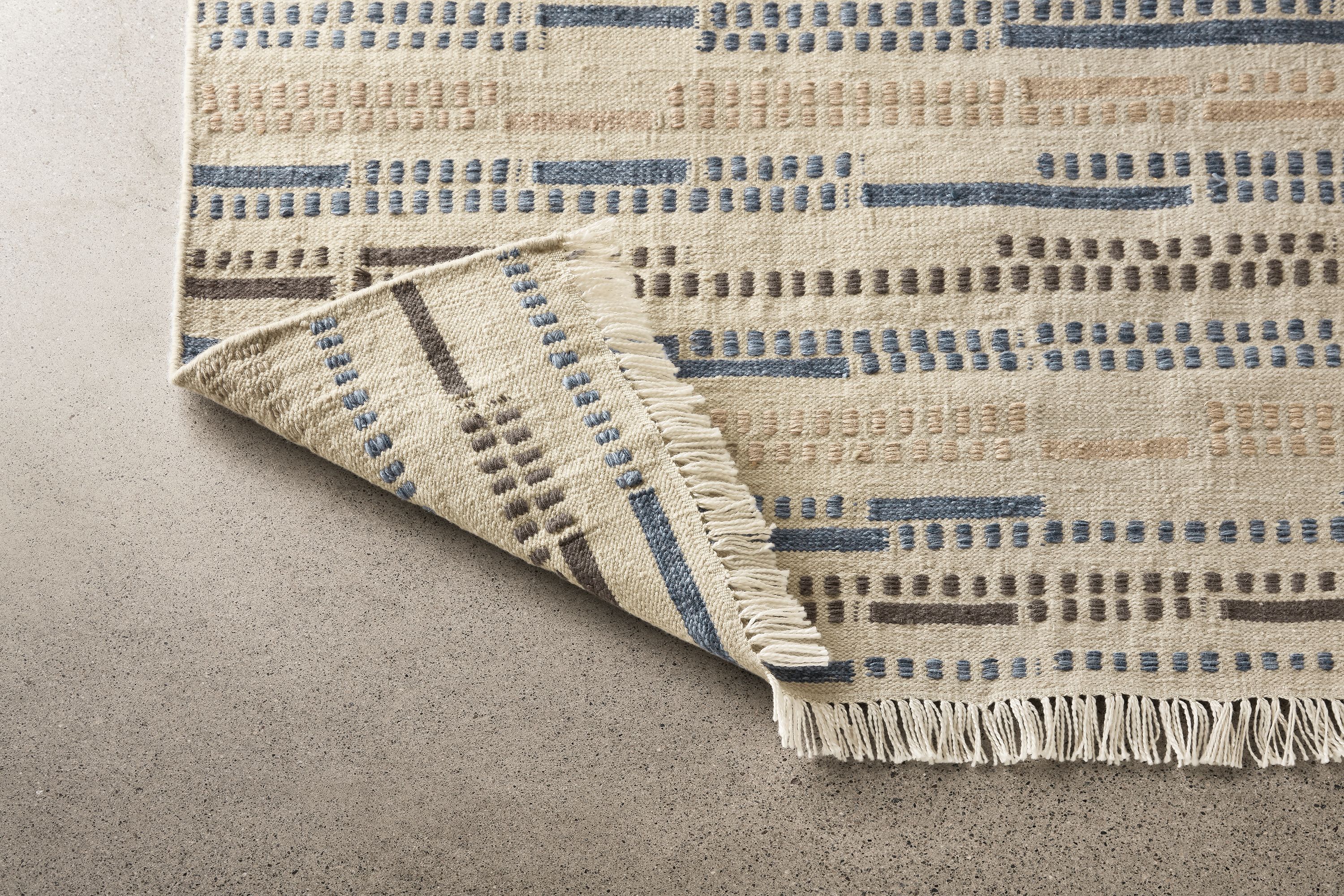 Close detail of Morse rug.