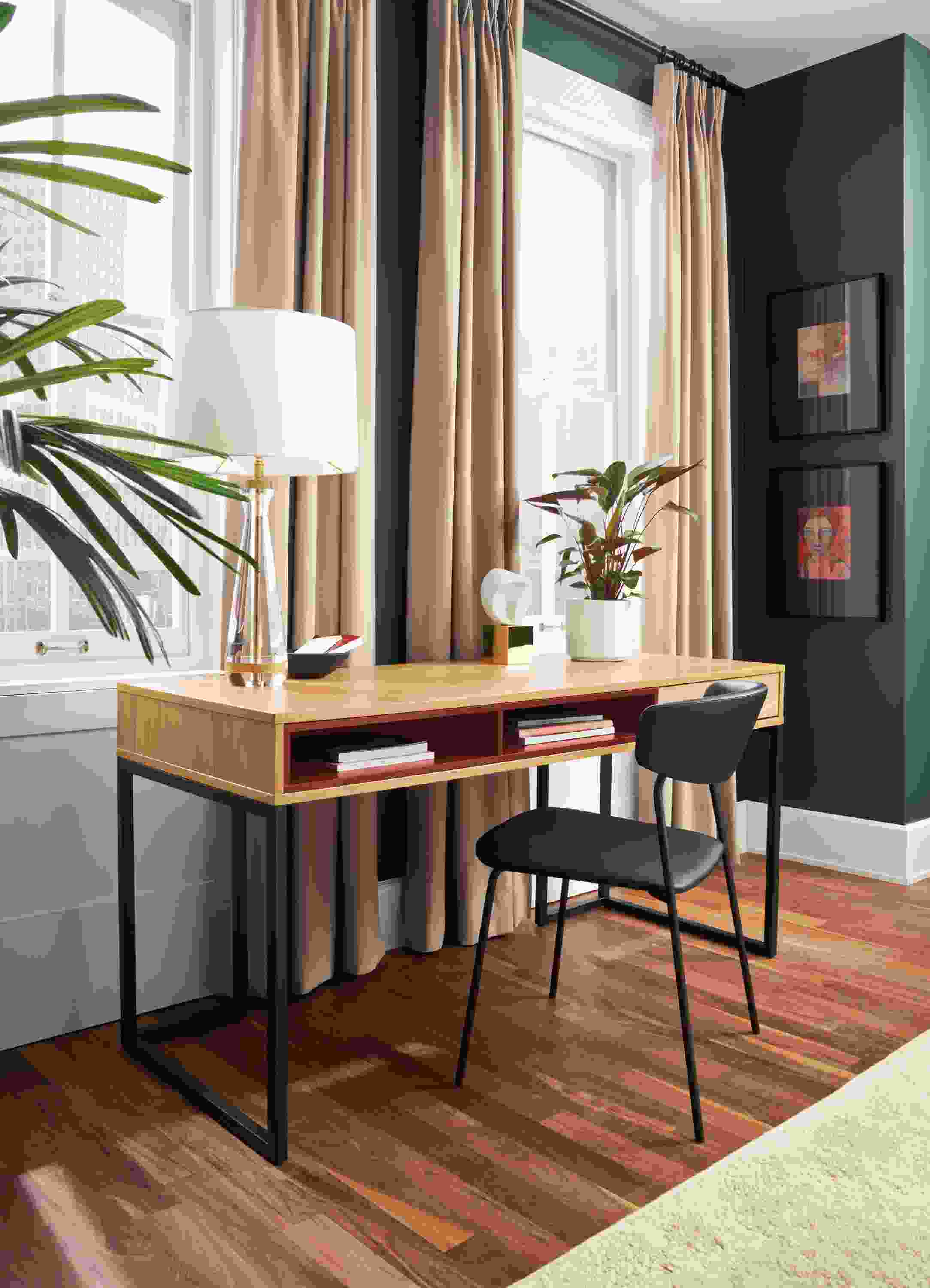 Room setting with a Mosby 60-wide Desk with a Wolfgang Side Chair in Sarno Leather and an Aram Rug.