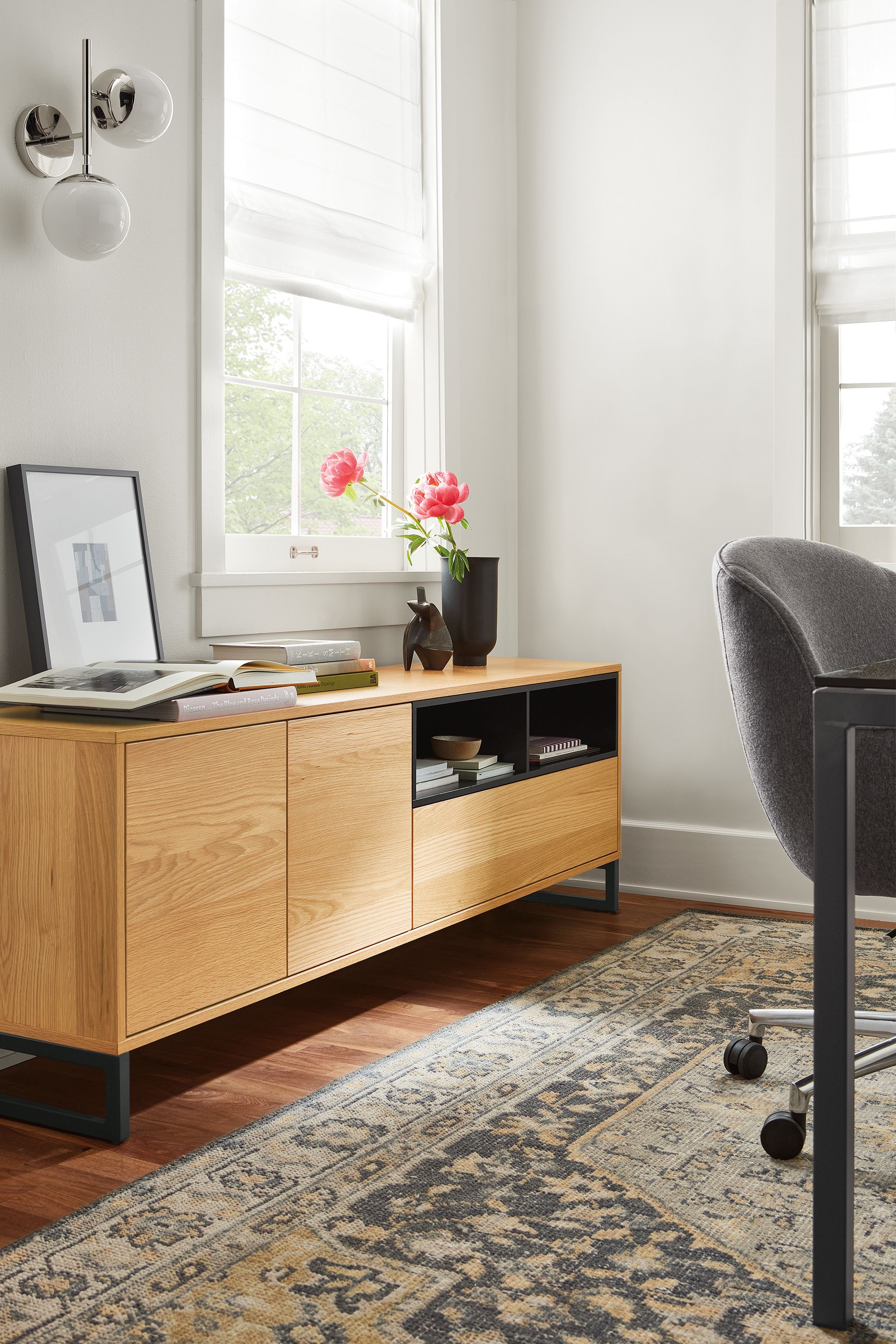 Office setting with a Mosby 72-wide office storage cabinet with a Veda rug in Smoke.