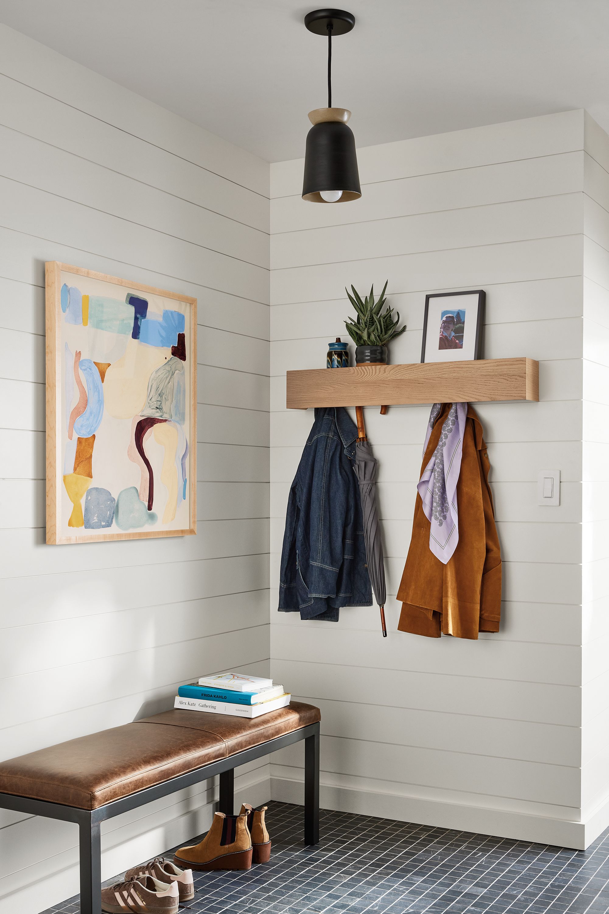 Entryway with Mullen 36-wide wall shelf with hooks in rye on red oak and Parsons bench in Palermo bourbon leather.