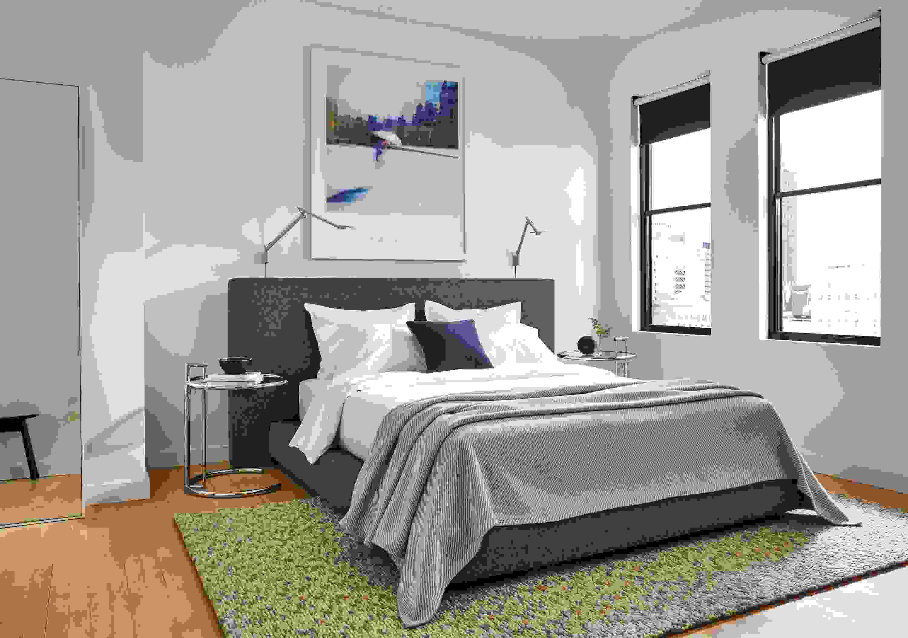 Bedroom setting with a Munro Queen Bed in Flint Fabric and two Eileen Gray Round End Tables on a Hastings Rug.
