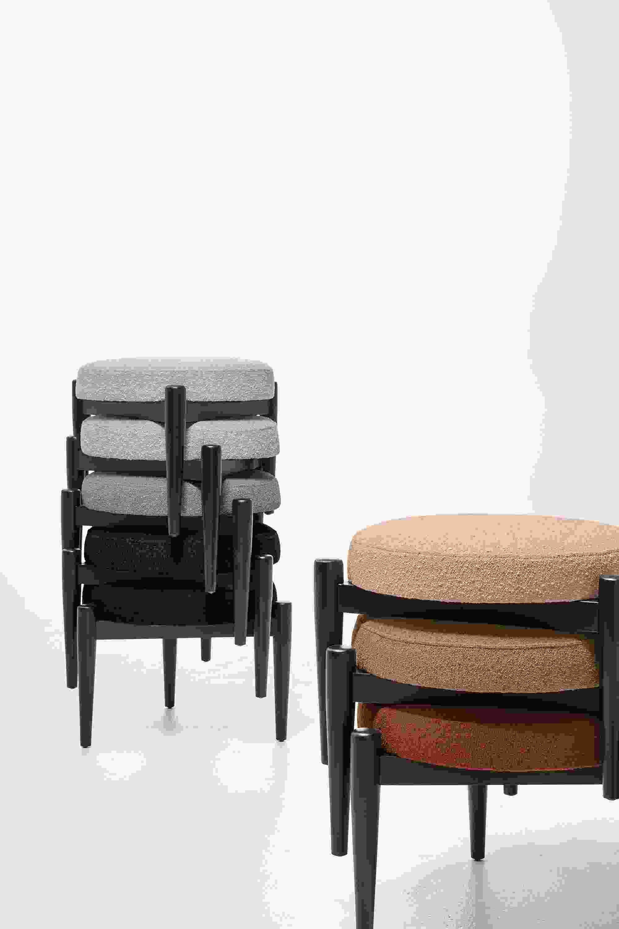 Detail of 8 stacked Murphy ottomans in declan fabrics.