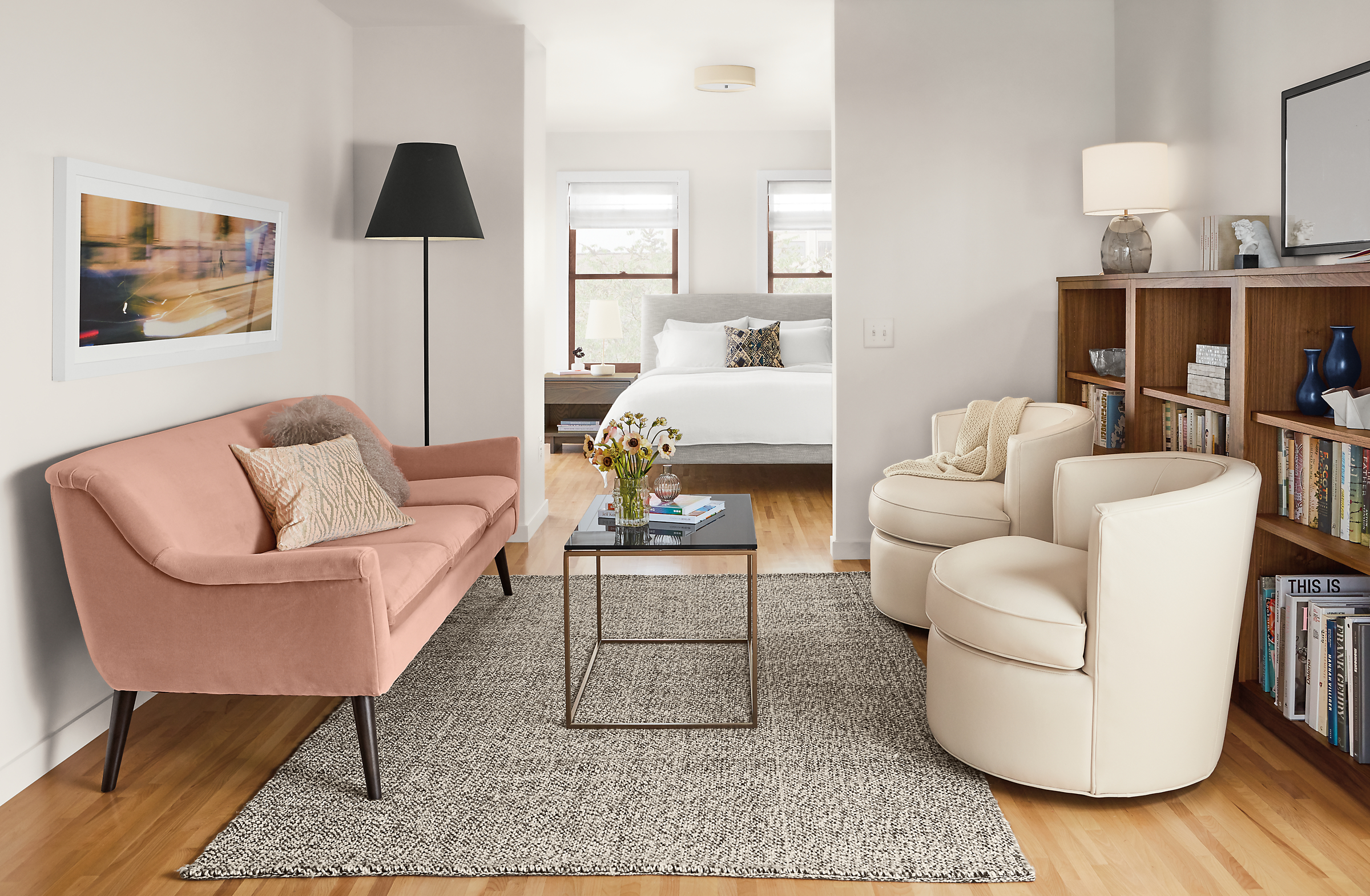 Murphy pink velvet sofa in small space.