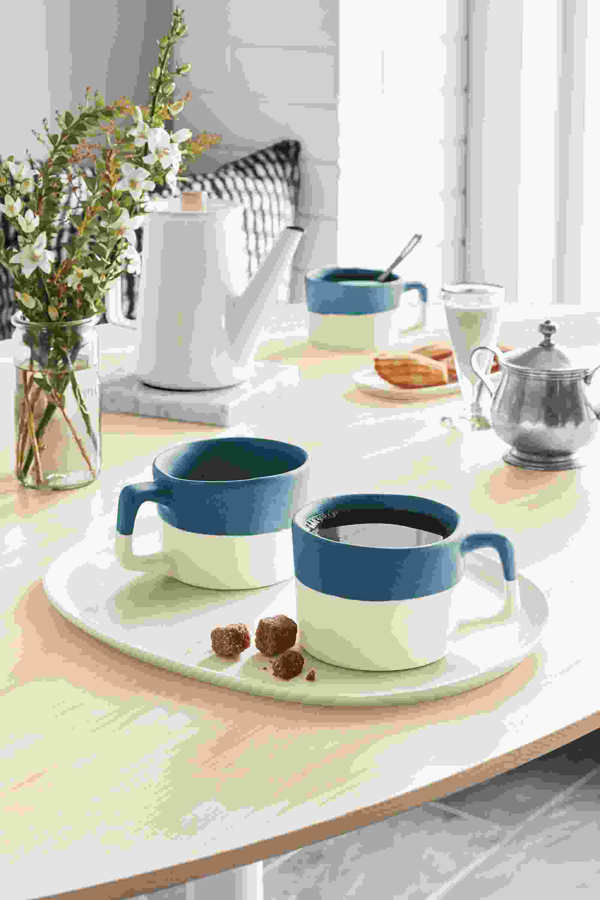 Table setting with Nadia servingware and Quarry trivet.