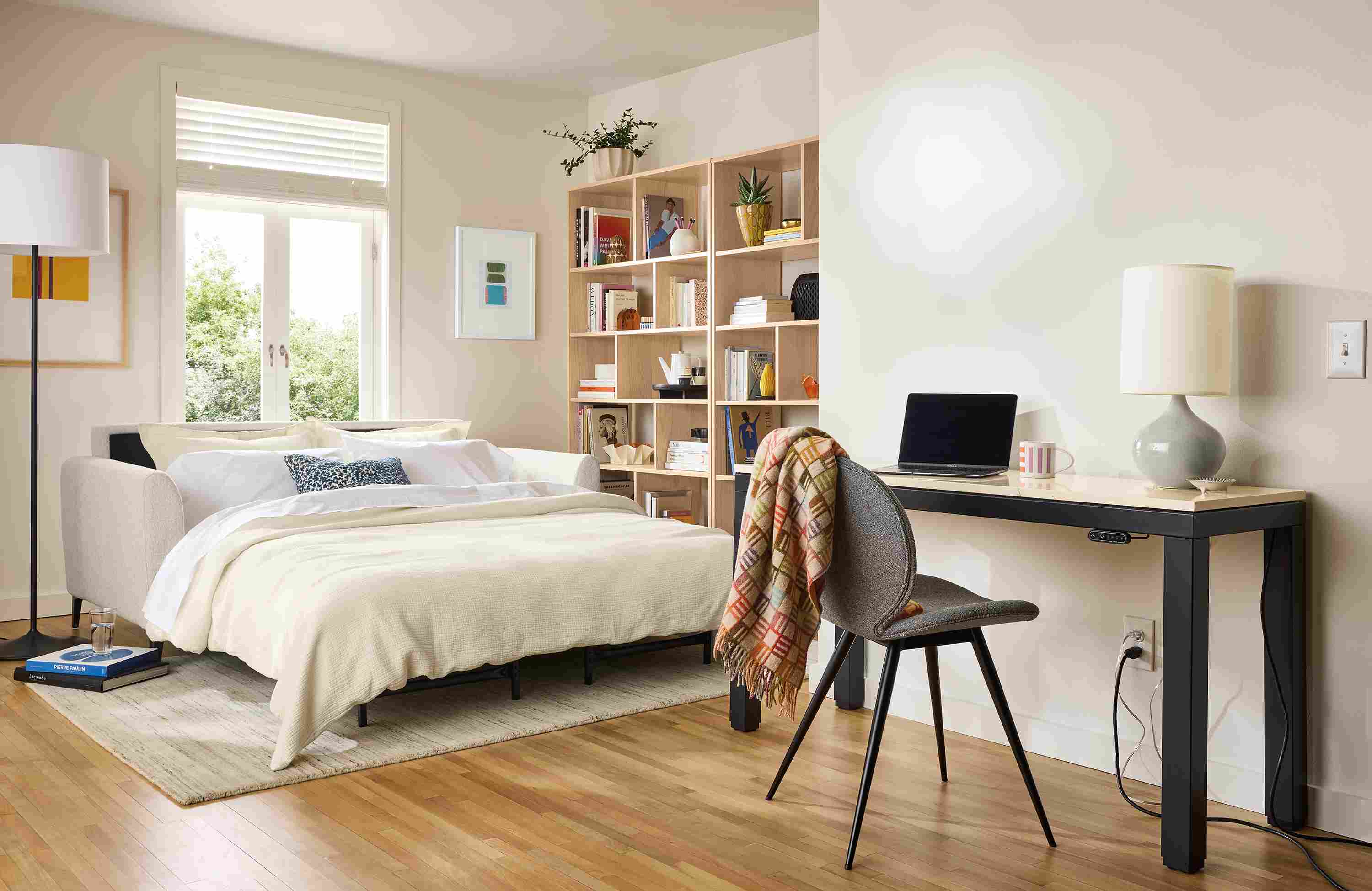 Apartment room with Natalia 72-wide queen sleeper sofa in Conley Natural shown with bed fully extended.