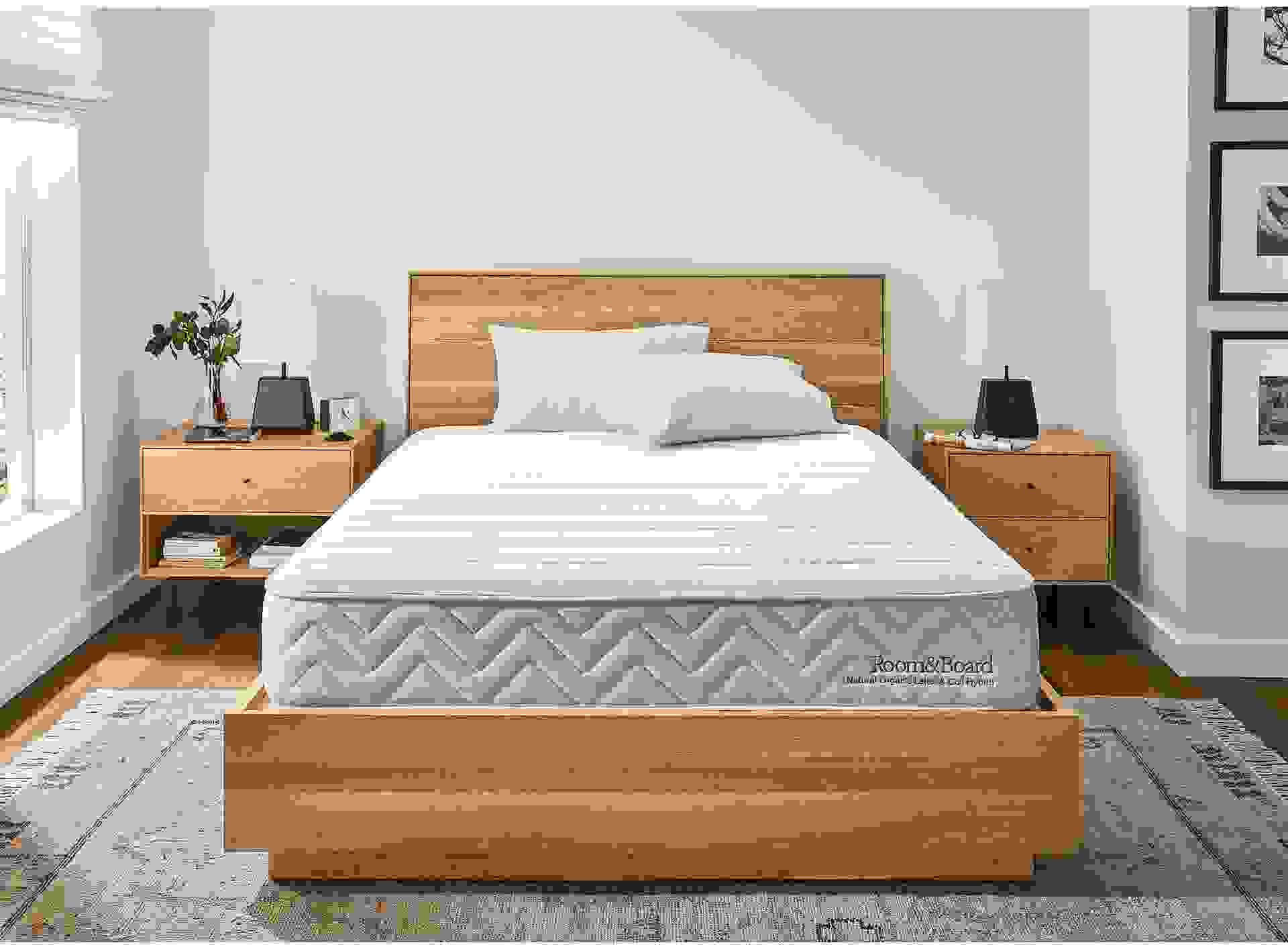 Detail of Natural organic latex & coil hybrid queen mattress in Natural style bedroom.