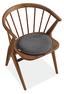 Detail of Nina 15-Round Seat Cushion in Felt Charcoal on Soren Dining Chair.