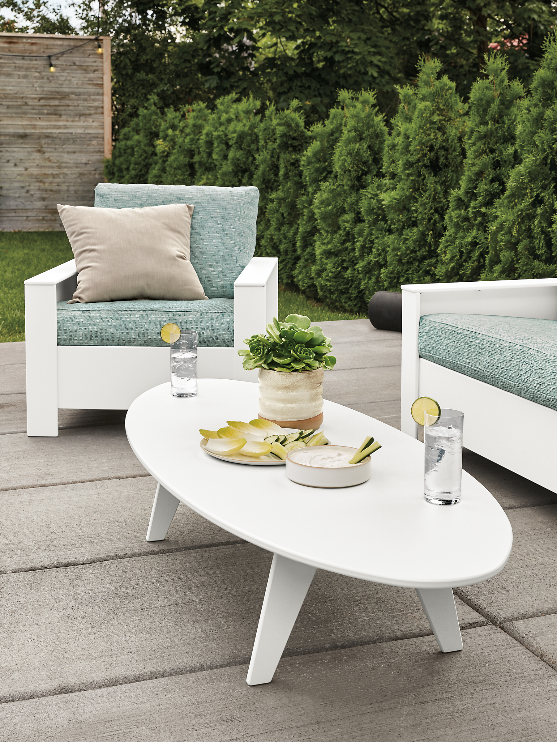 Detail of Nova coffee table in white on patio.