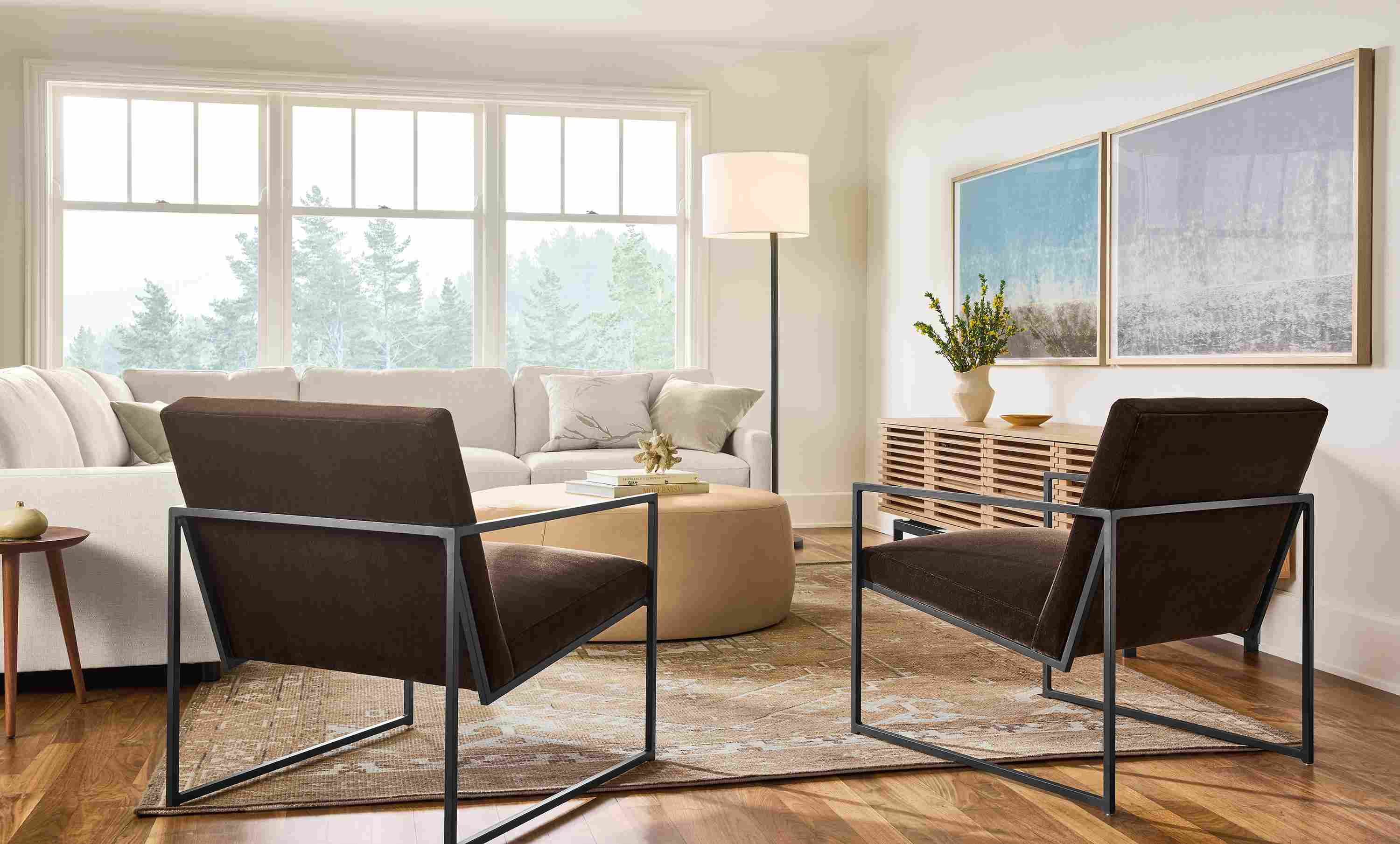 Living room with 2 Novato chairs in Redding Espresso and Linger 3-piece sectional in Sumner Ivory.