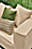 Close-up of an Oasis sofa with Outdoor throw pillows.  