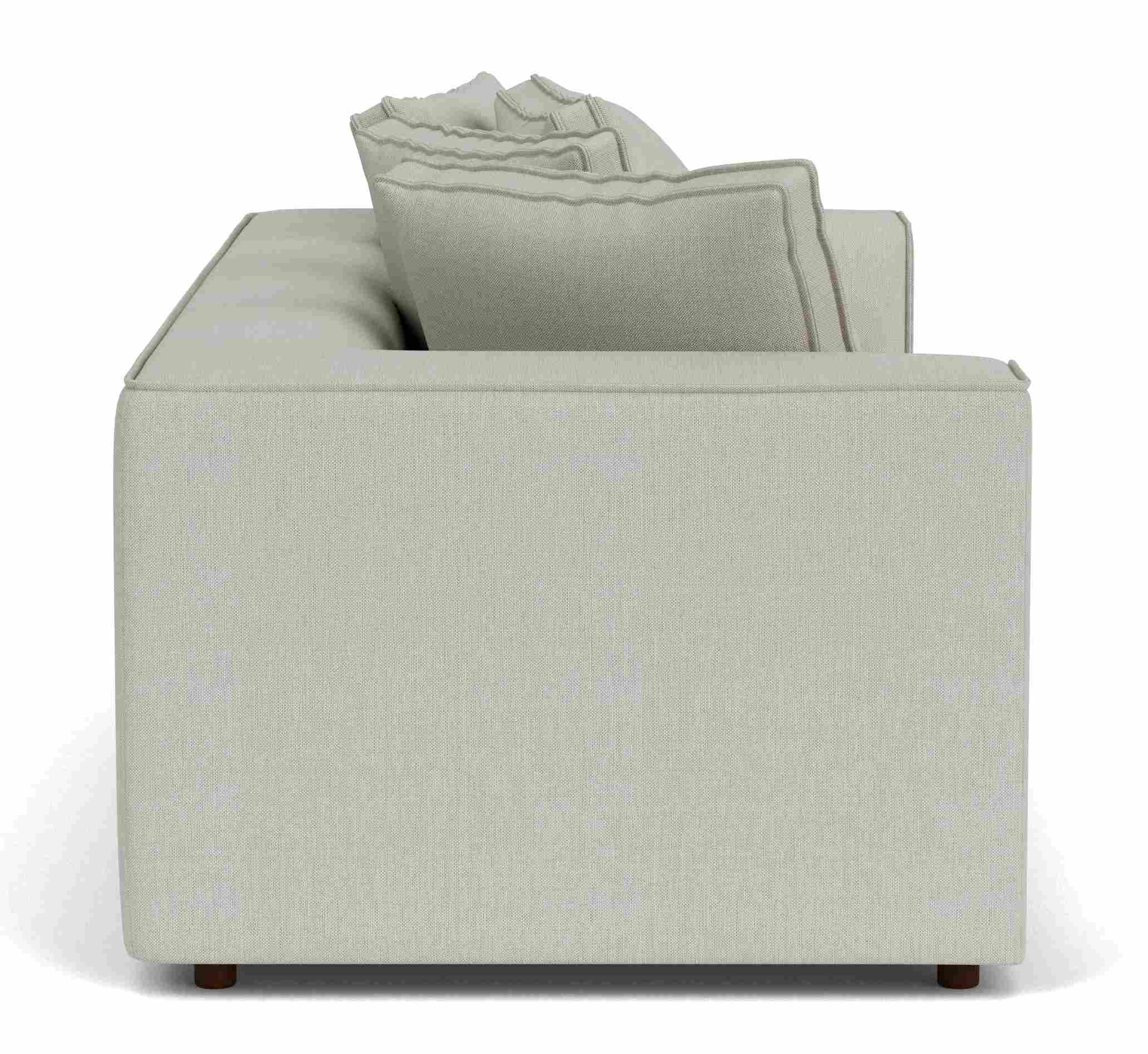 Side view of Oasis Armless Chair in Mist grey fabric.