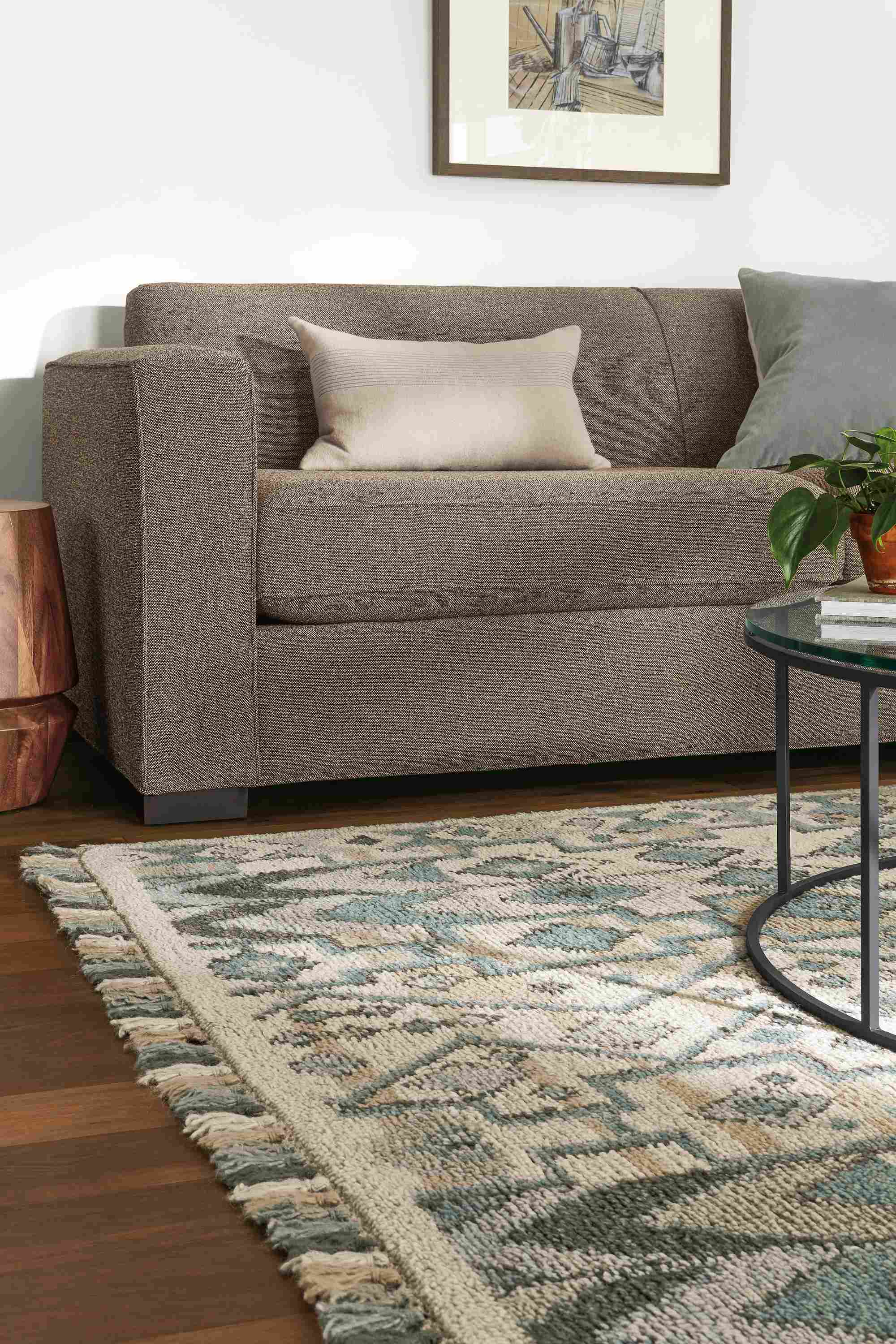 Detail of Ona rug in Ocean color in living room.