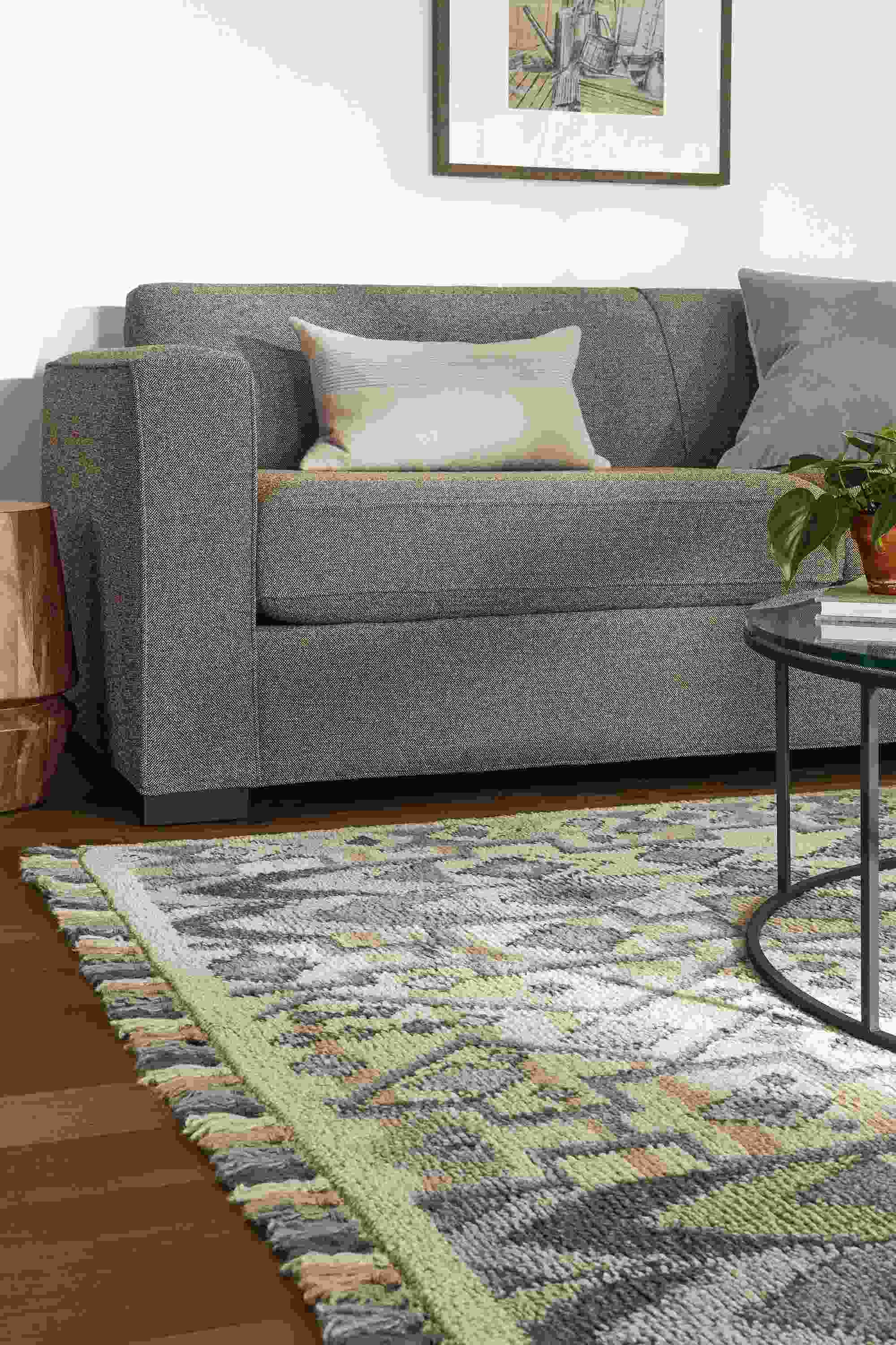 Detail of Ona rug in Ocean color in living room.