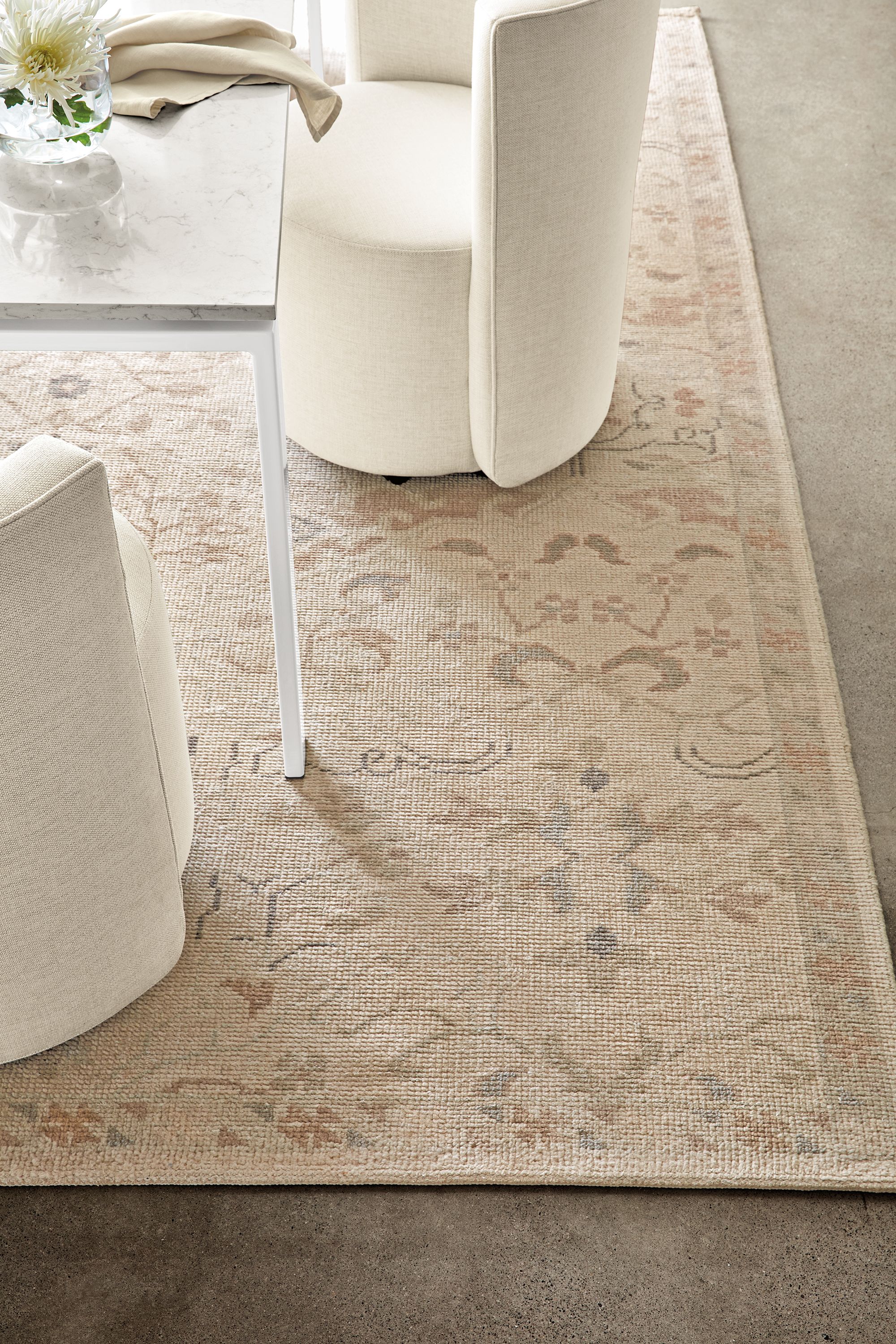 Dining room setting with Ophelia Rug in Pumice and Rand 72-wide Table.