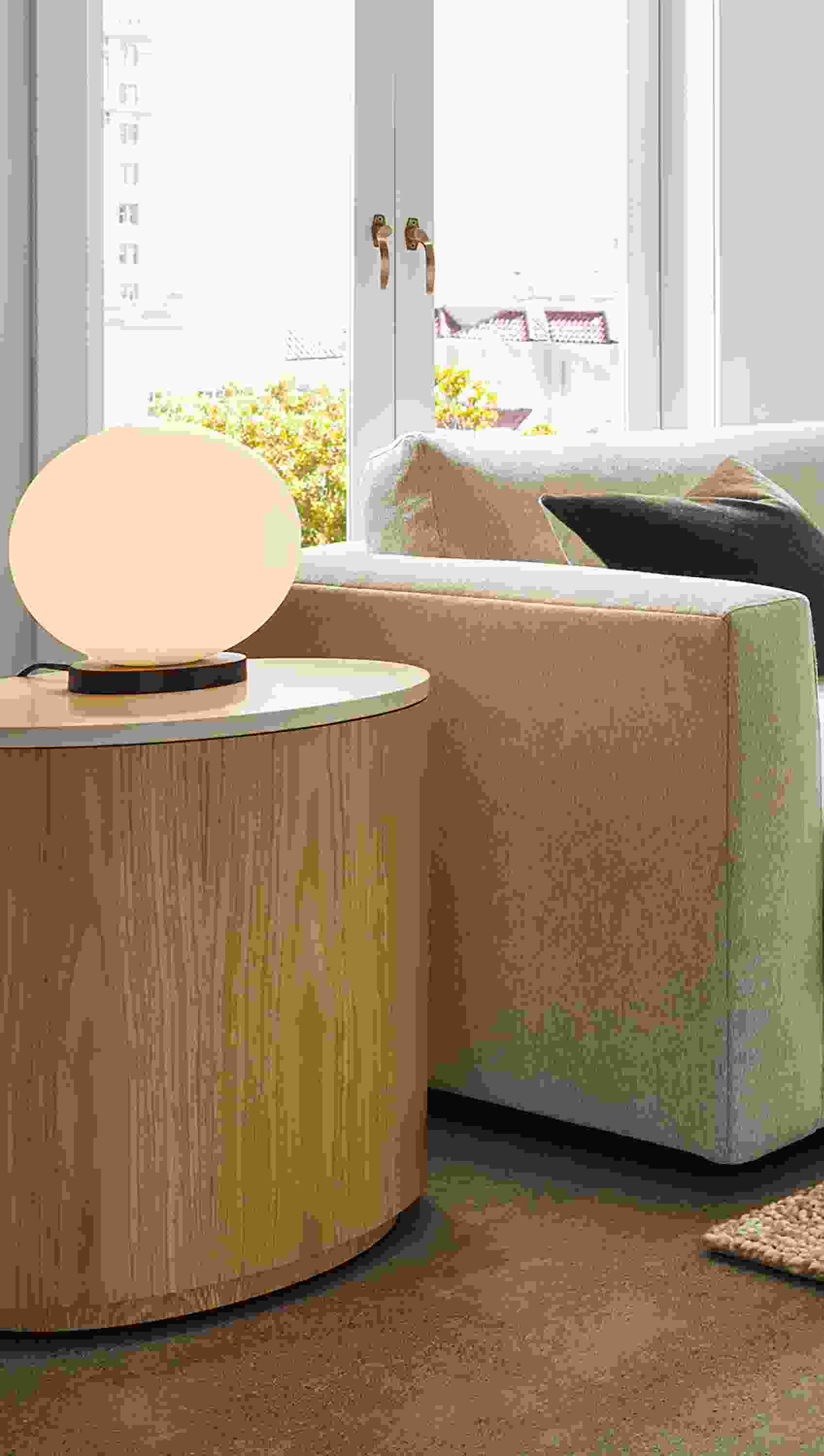 Close-up of a Clemens Extra Deep sofa with a Liam end table.