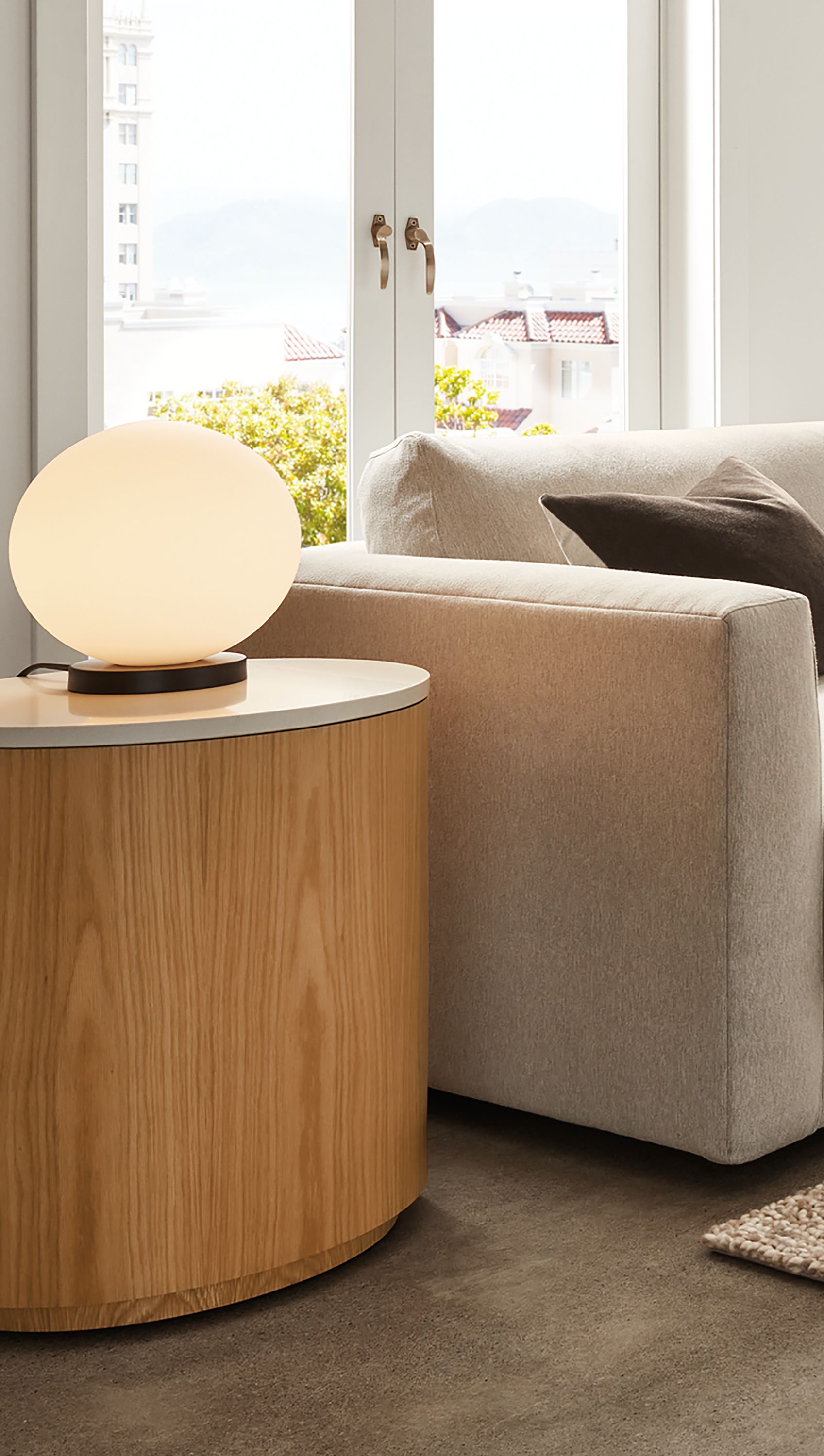 Close-up of a Clemens Extra Deep sofa with a Liam end table.