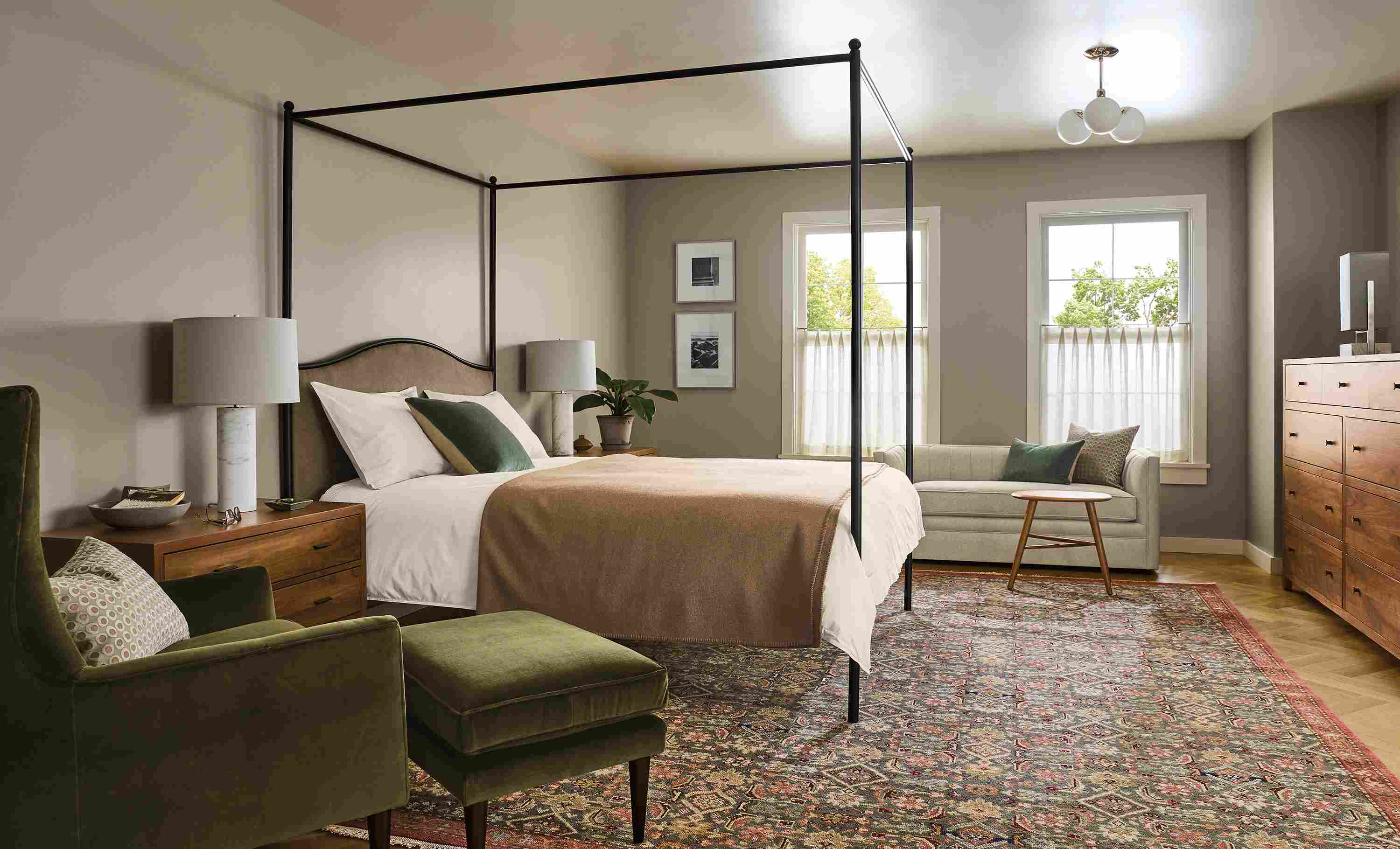 Bedroom with Orian queen bed in windsor otter and Bradford chair and ottoman in Vance Olive fabric.