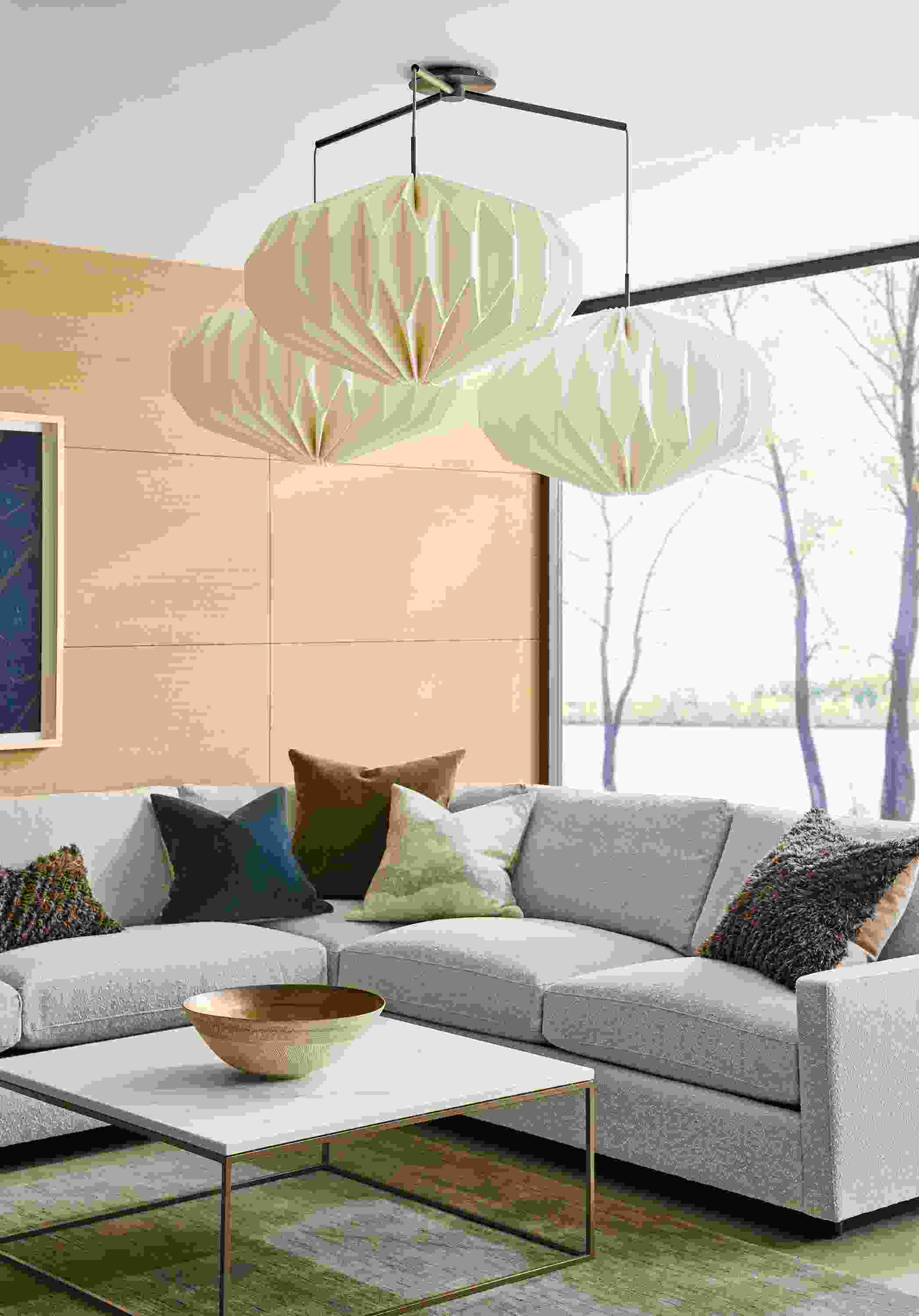 Living room with Orikata set of 3 pendant lights with 24-inch saucers in ivory with oil rubbed bronze graphite hardware.