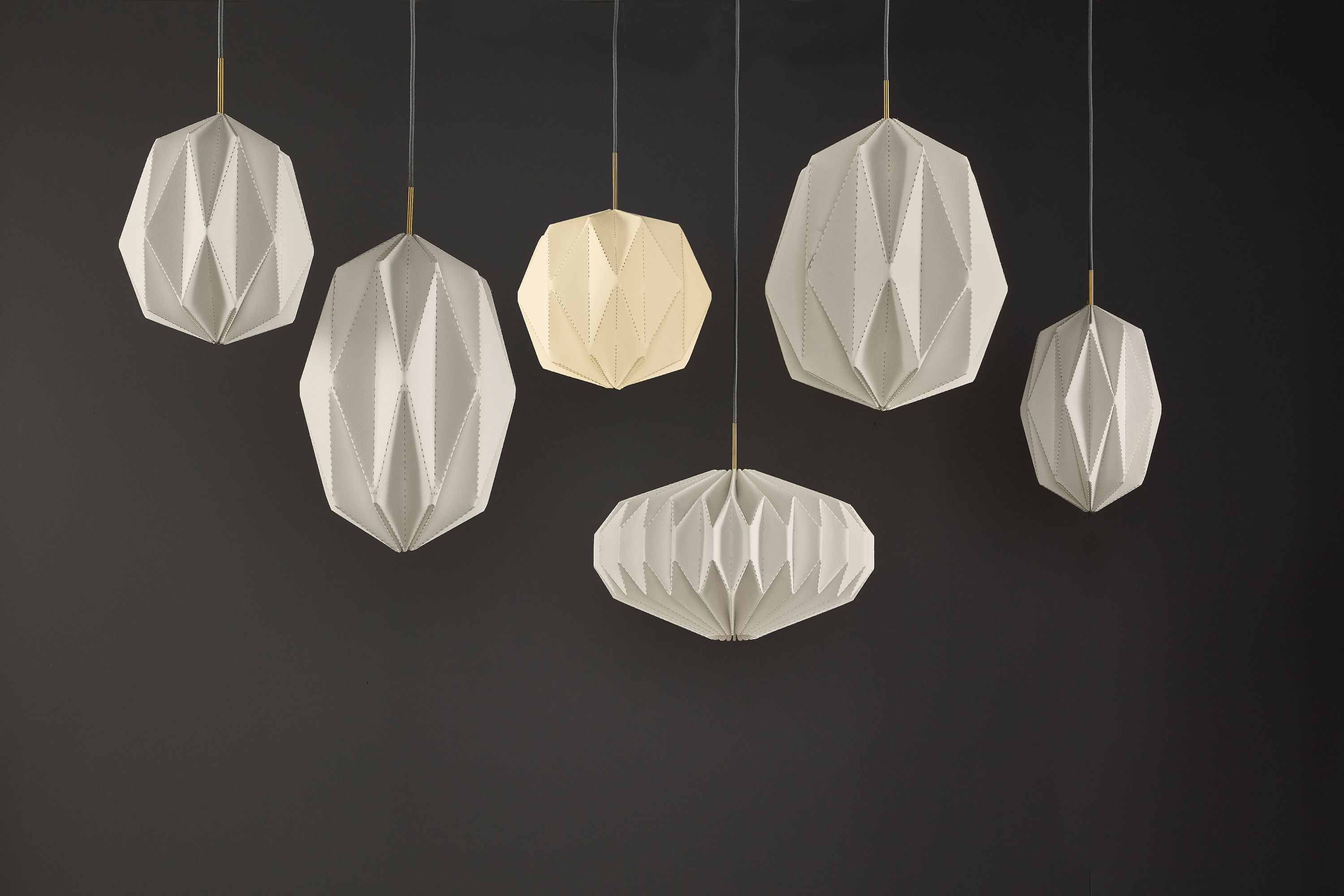 Collage of Orikata pendant lights.