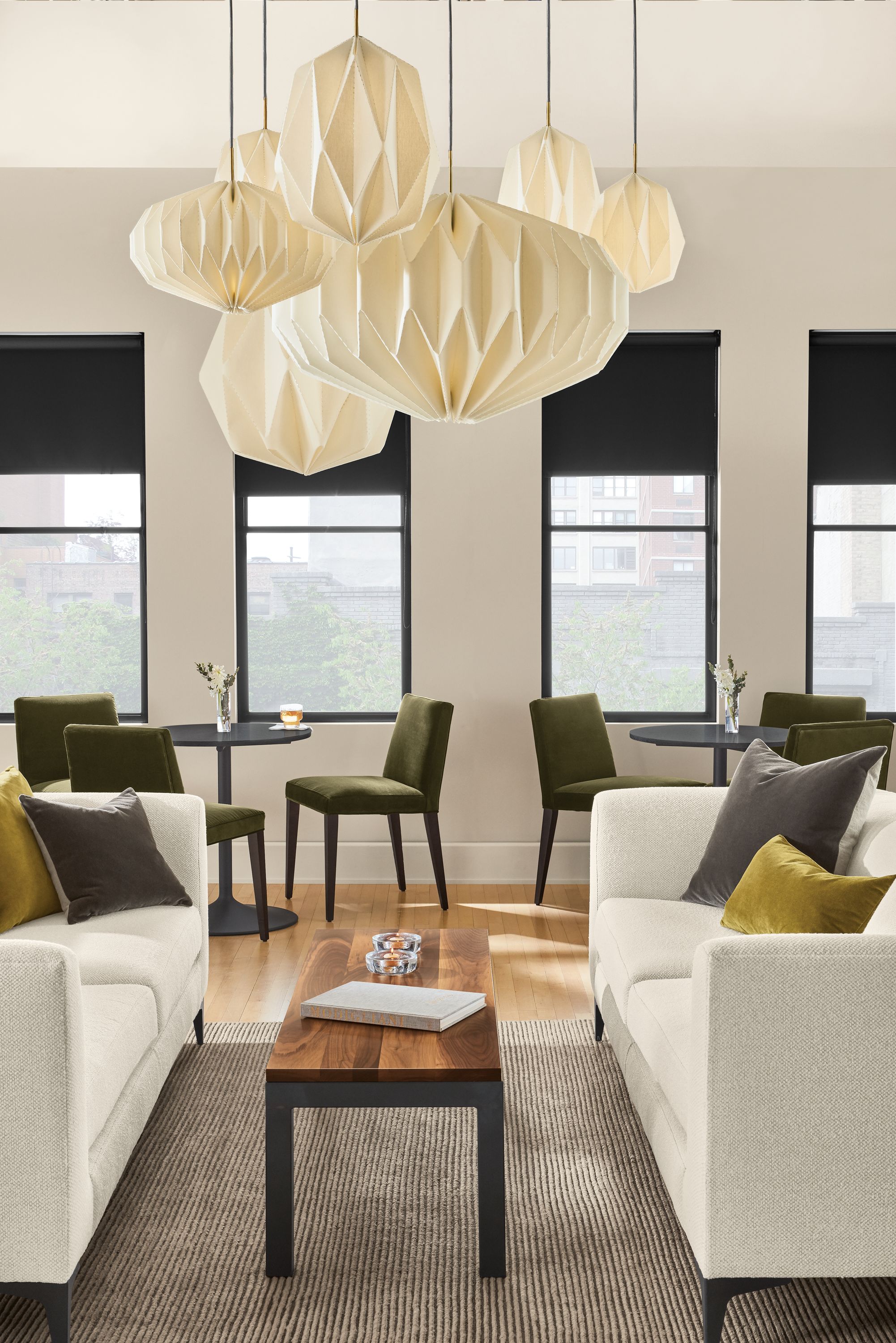 Room setting with an Orlin Coffee Table with York Sofa in Sumner Linen and a Boden Chair in Urbino Leather.