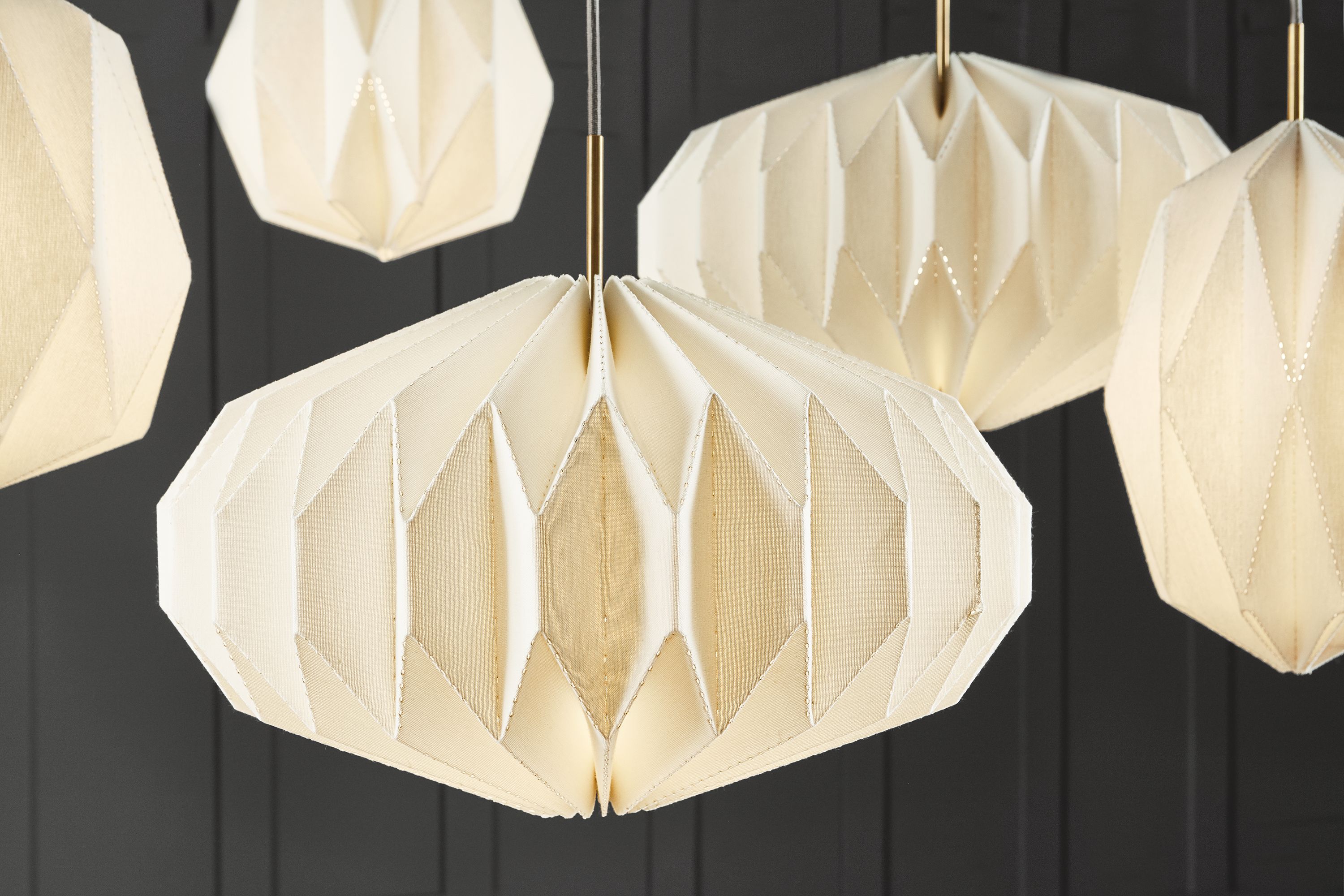 Collage of Orikata pendant lights.