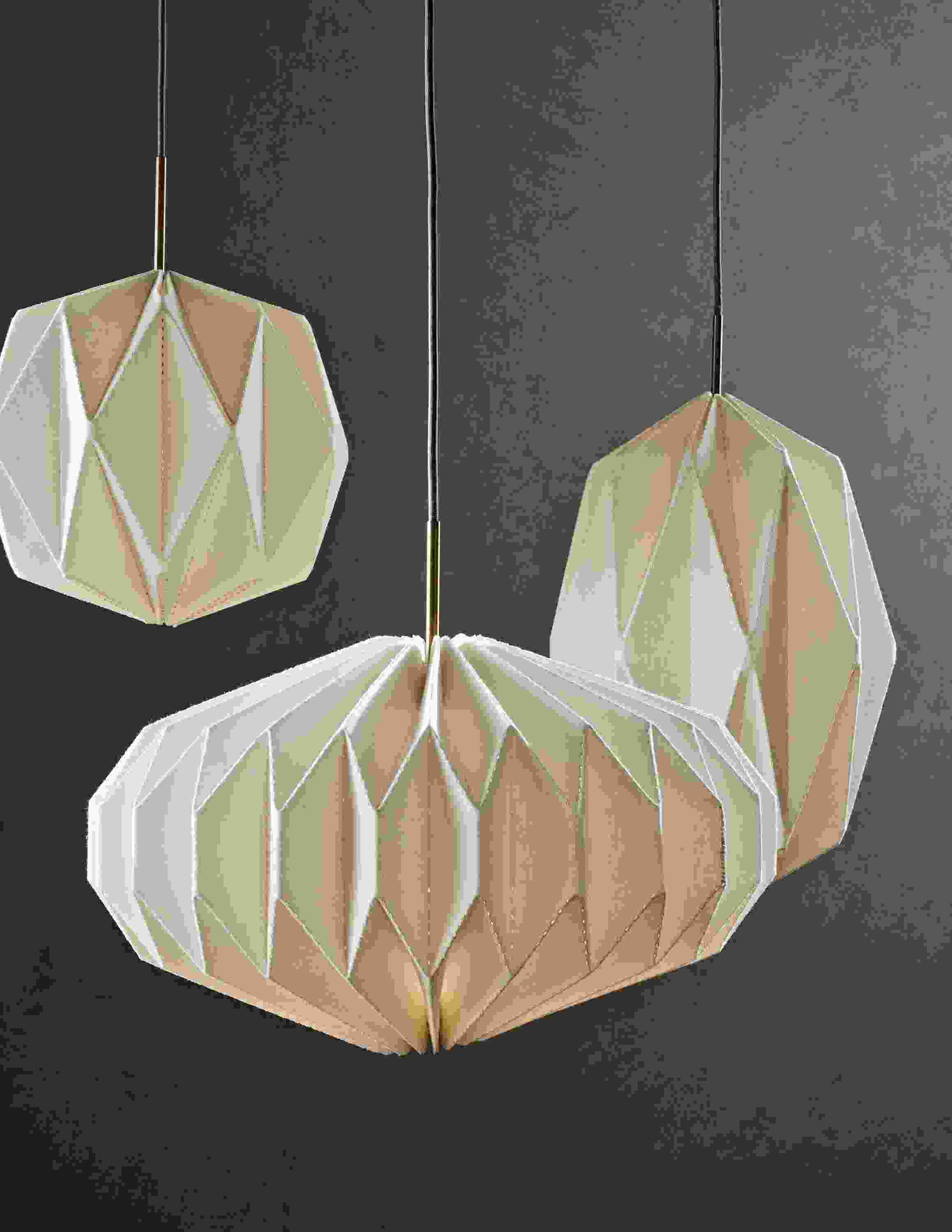 Close detail of Orikata saucer pendants.