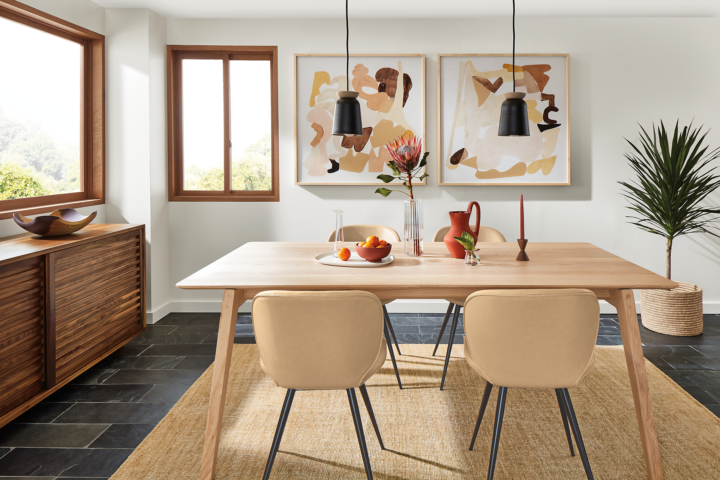 dining room with colorful modern decor featuring orlin table in heartwood ash.