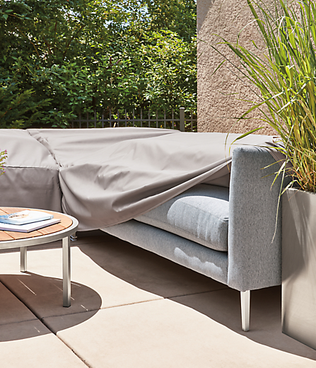 Outdoor patio setting with a Palm sectional and Outdoor Cover.