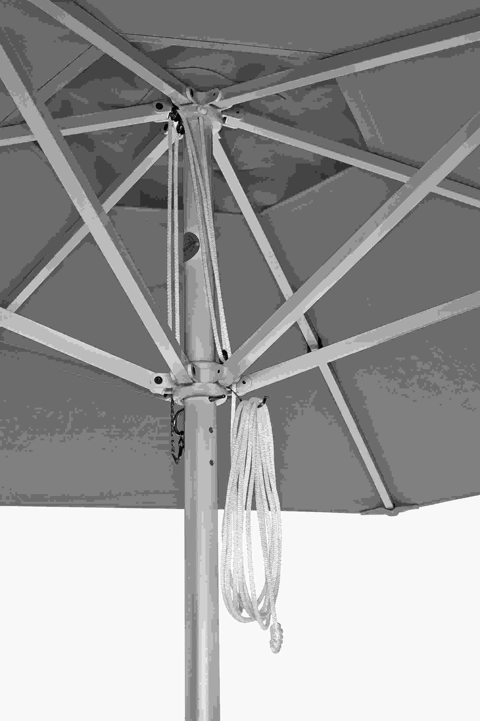 Detail of the rib assembly in platinum on a Pacifica round umbrella in Jace Mink.