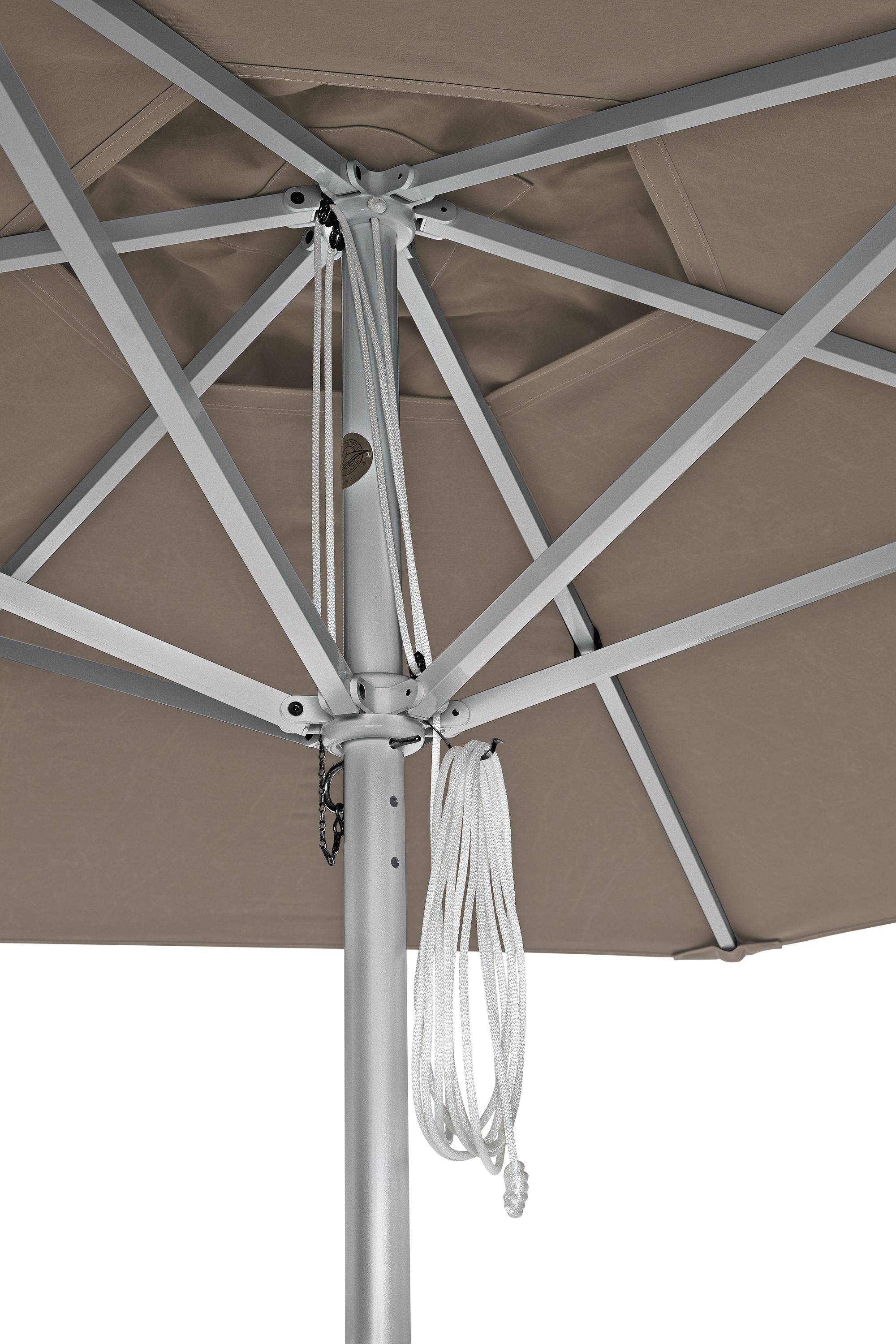 Detail of the rib assembly in platinum on a Pacifica round umbrella in Jace Mink.