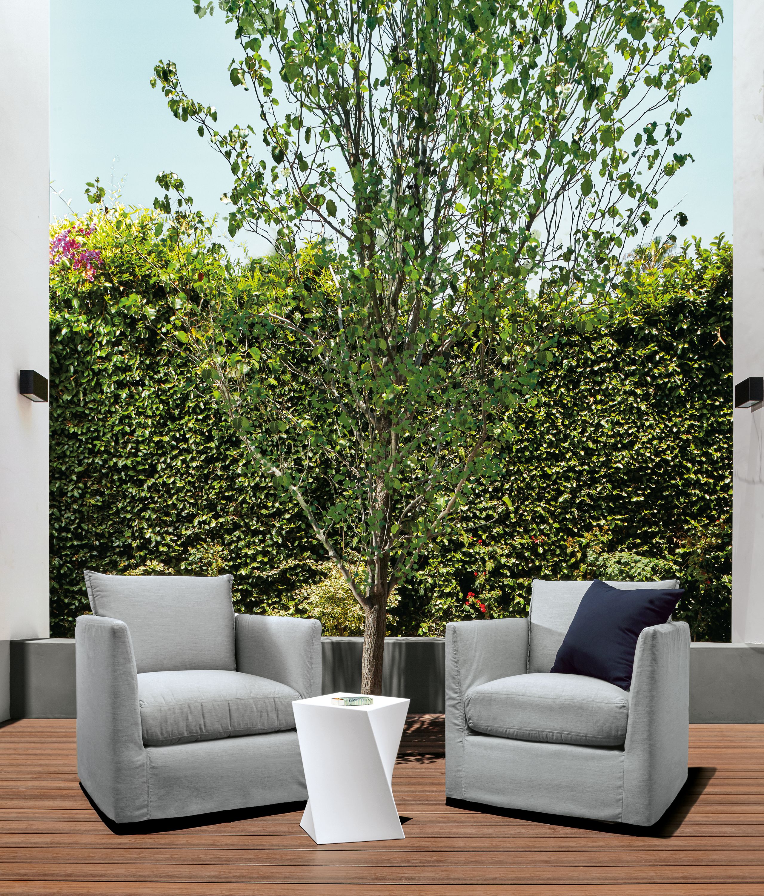 Detail of two Palm swivel chairs.