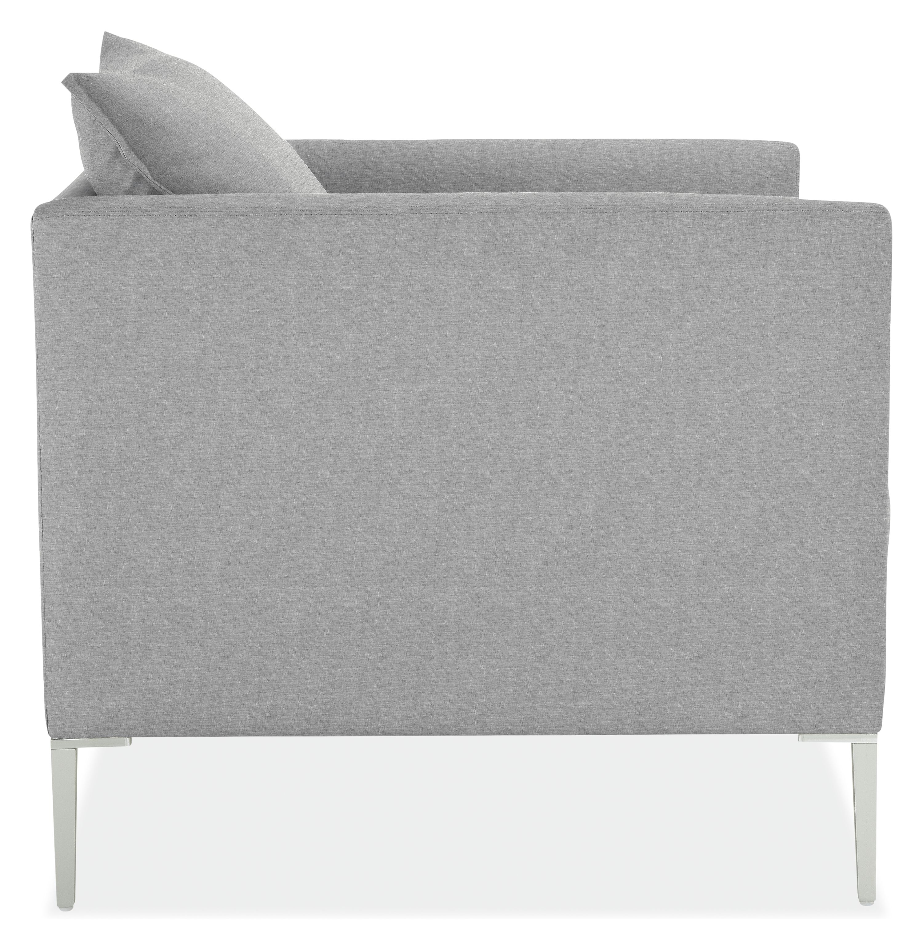 Side view of Palm Chair in Sunbrella Canvas Cement.