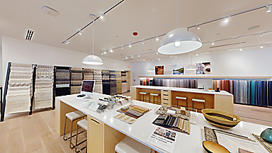 Room and Board store in Paramus, New Jersey showing the design area with various fabric swatches.