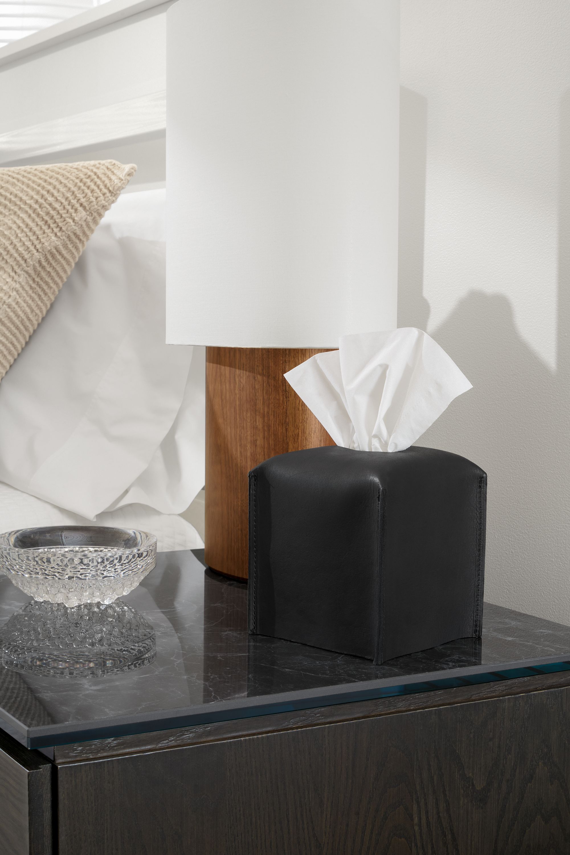Detail of a Paros Square Tissue Box Cover in Sellare Black leather on nightstand.