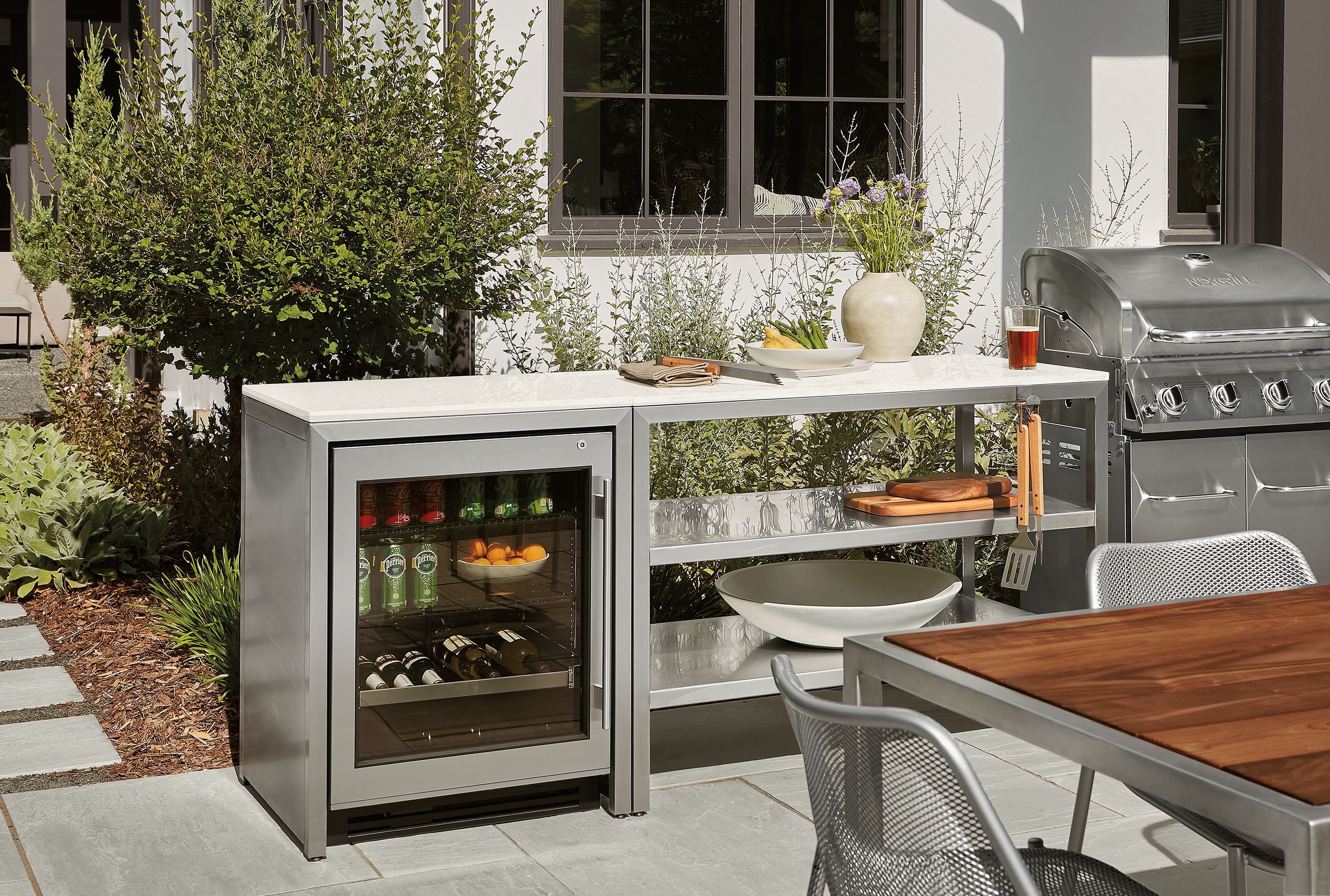 76w 24d, 2-piece modular island with glass door fridge and beverage interior; stainless steel & marbled white quartz top