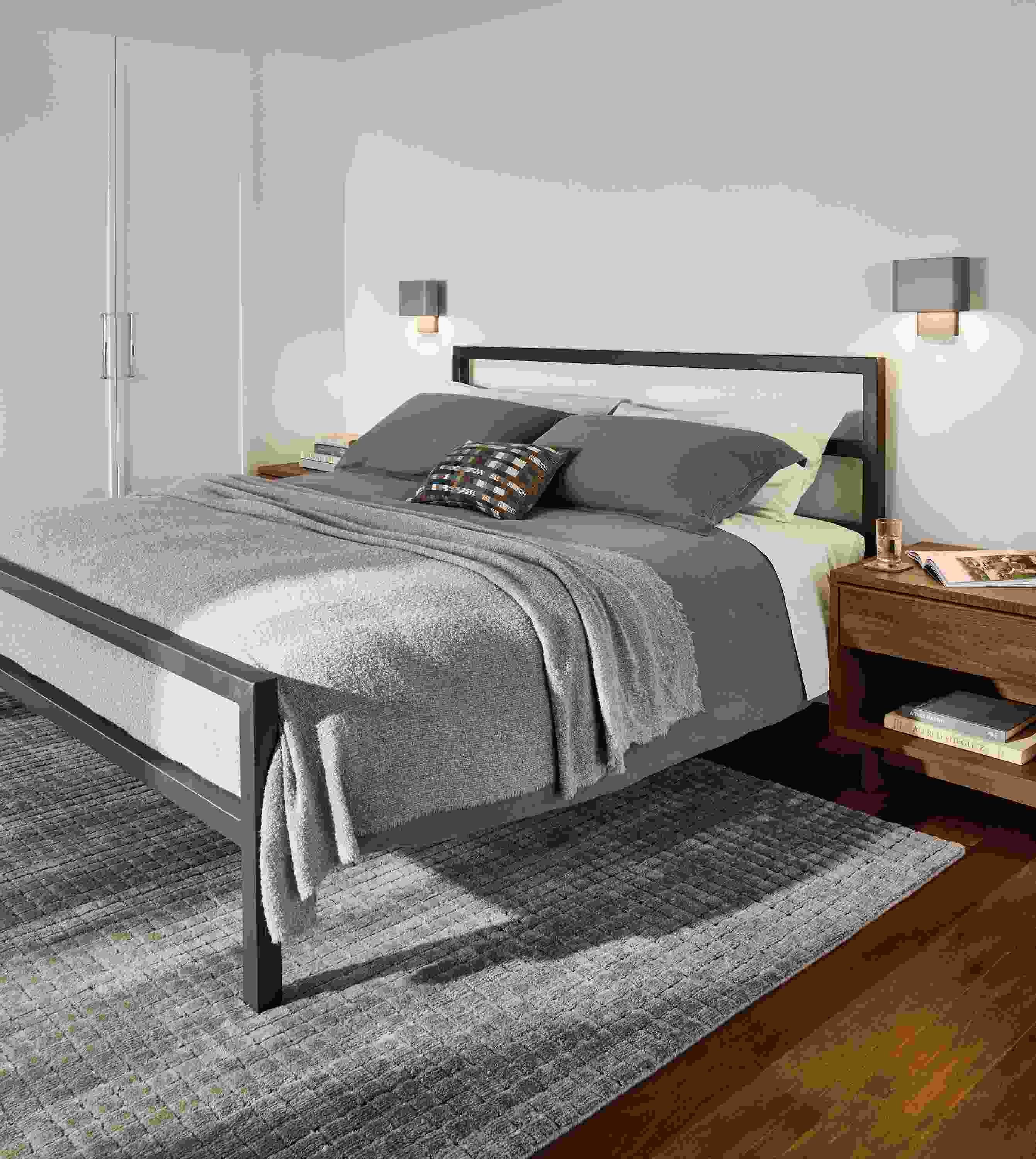 Bedroom with Parsons king bed in natural steel, Safira rug in putty and Strand king duvet set in dusk.