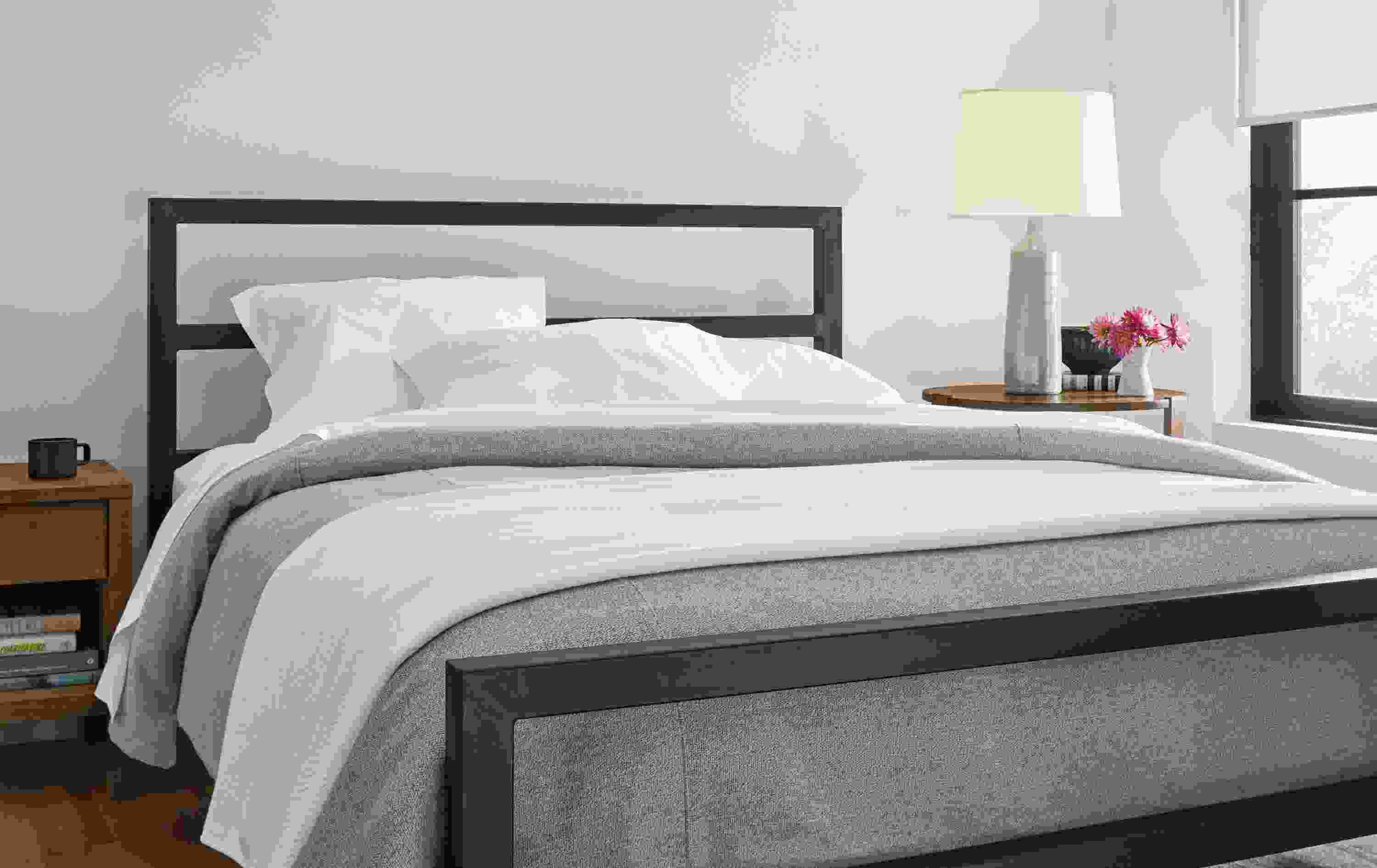 Side detail of Parsons natural steel bed.